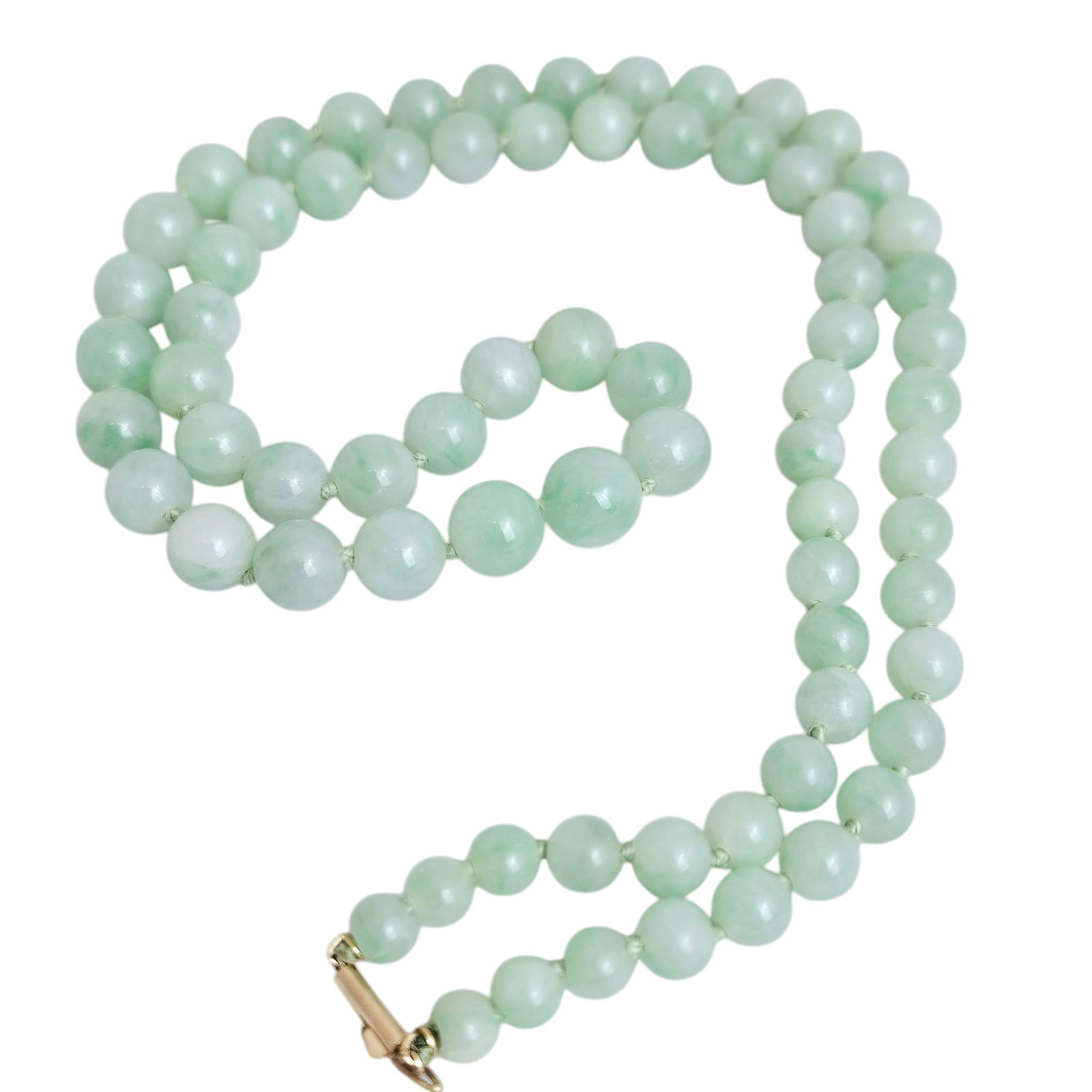 Jade Bead, 14k Yellow Gold Necklace: Composed of seventy-three round jadeite beads graduating from approximately 10.0 to 6.0 mm, completed by a 14k yellow gold tongue-and-groove clasp with figure-eight safety forming a 24 inch neckl