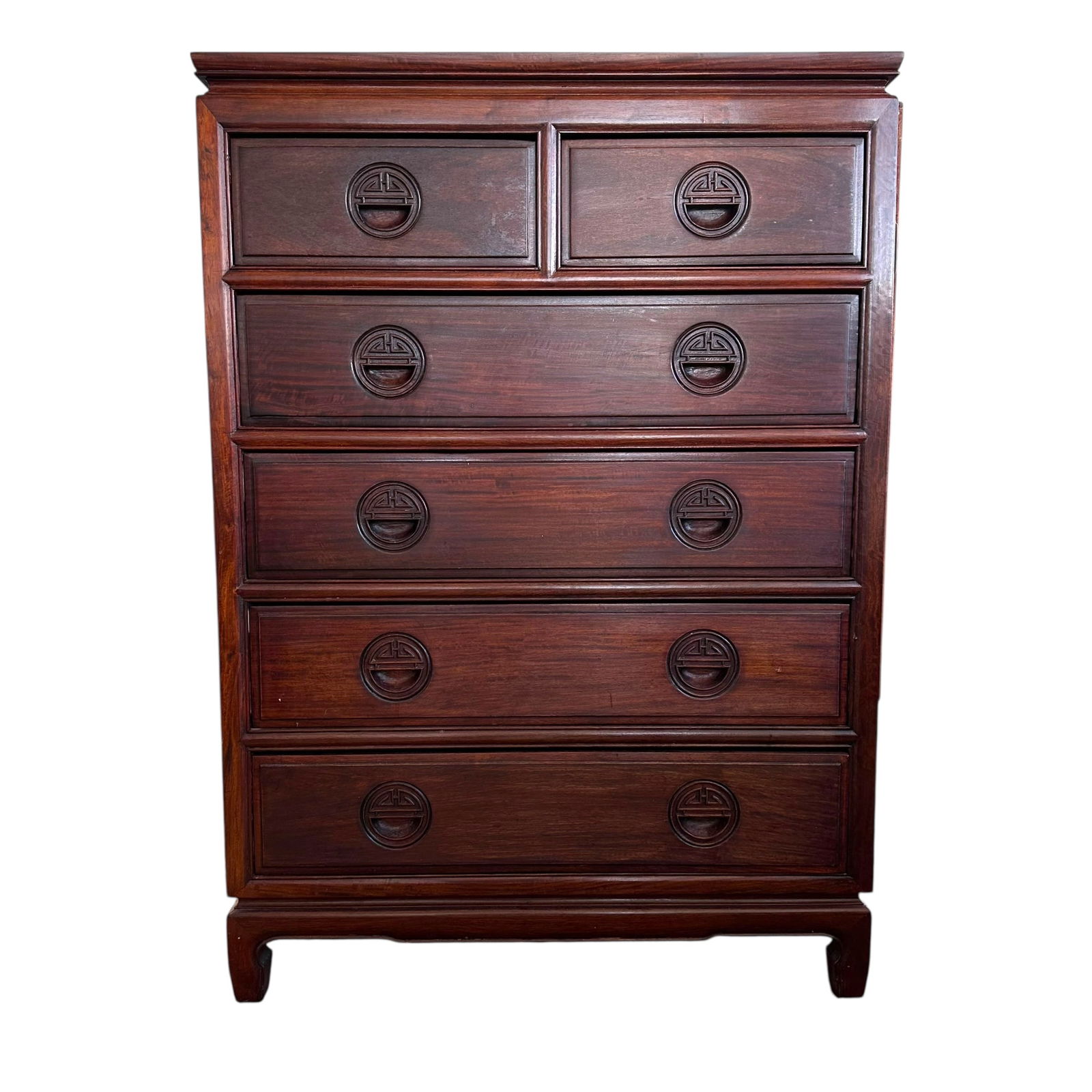Japanese Rosewood High Chest of Drawers: A Japanese rosewood high chest of drawers with 6 drawers and carved drawer handles. Condition is good, with signs of fading from age.