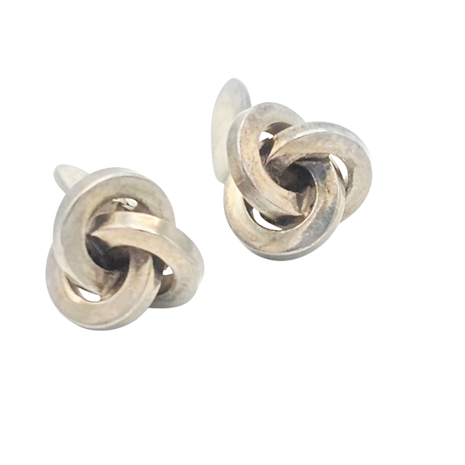 Pair of Danish Sterling Silver Cufflinks, A & K: Each designed as a knot, set in a sterling silver cufflink mounting measuring approximately 1.00 x 0.70 inches. Marked: 'Sterling, Denmark, A&K (Aarre & Krogh Eftf.)