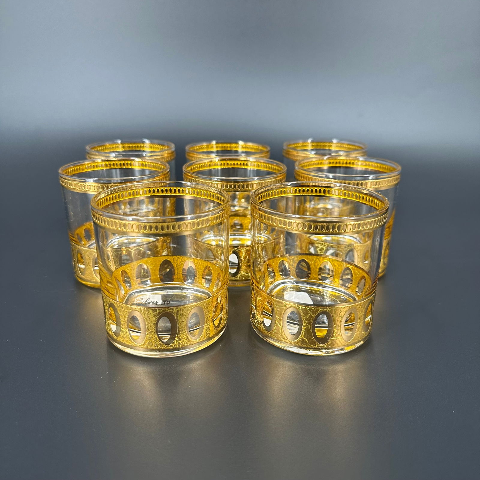 (Lot of) 8 Culver Ltd "Antigua" Old-Fashioned Glasses: (Lot of) 8 Culver Ltd "Antigua" Old-Fashioned glasses with gold accents to base and rim. Signed Culver Ltd. Measures approximately 3 in H x 2 3/4 in D. Condition is very good, slight fading