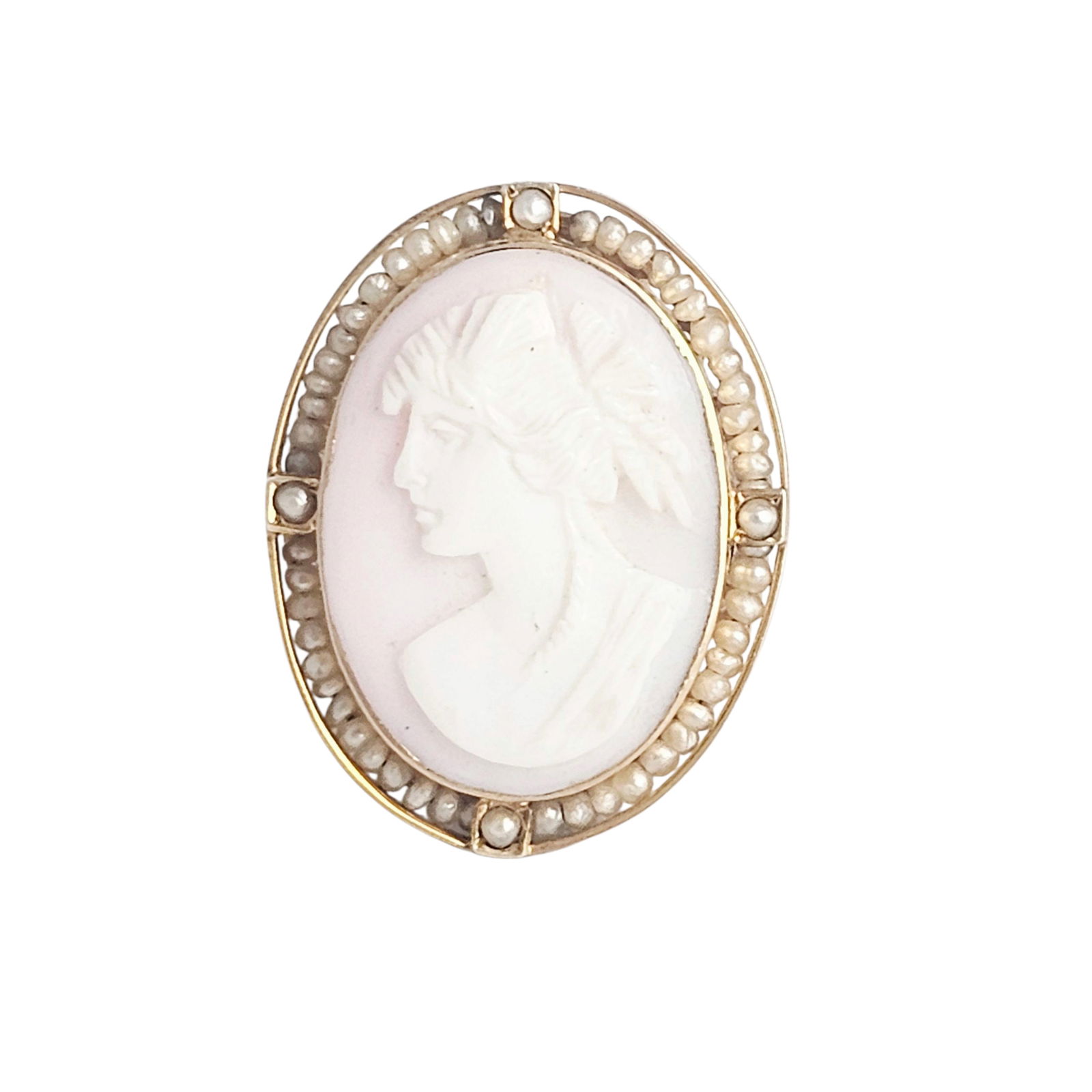 Shell Cameo, Seed Pearl, 14k Yellow Gold Ring: Featuring an oval shell cameo of a classical beauty in profile accented by seed pearls, joined to a 14k yellow gold foliate motif shank enhanced by pink enamel, forming a ring measuring approximately