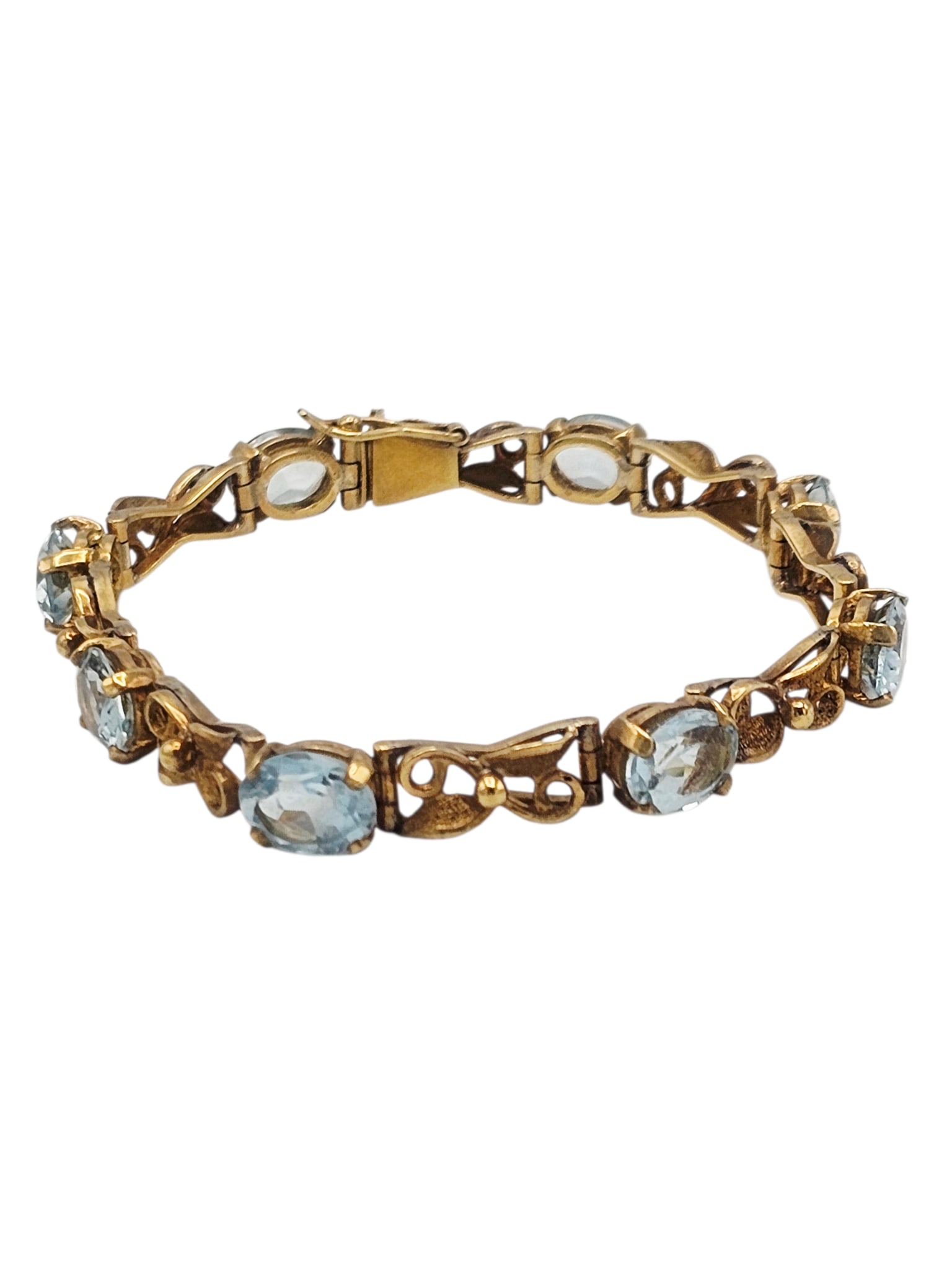 Aquamarine, 18k Yellow Gold Bracelet: Featuring eight oval-cut aquamarines weighing a total of approximately 11.60 ctw., set in articulated, 18k yellow gold links, completed by a tongue-and-groove clasp with figure-eight safety formi
