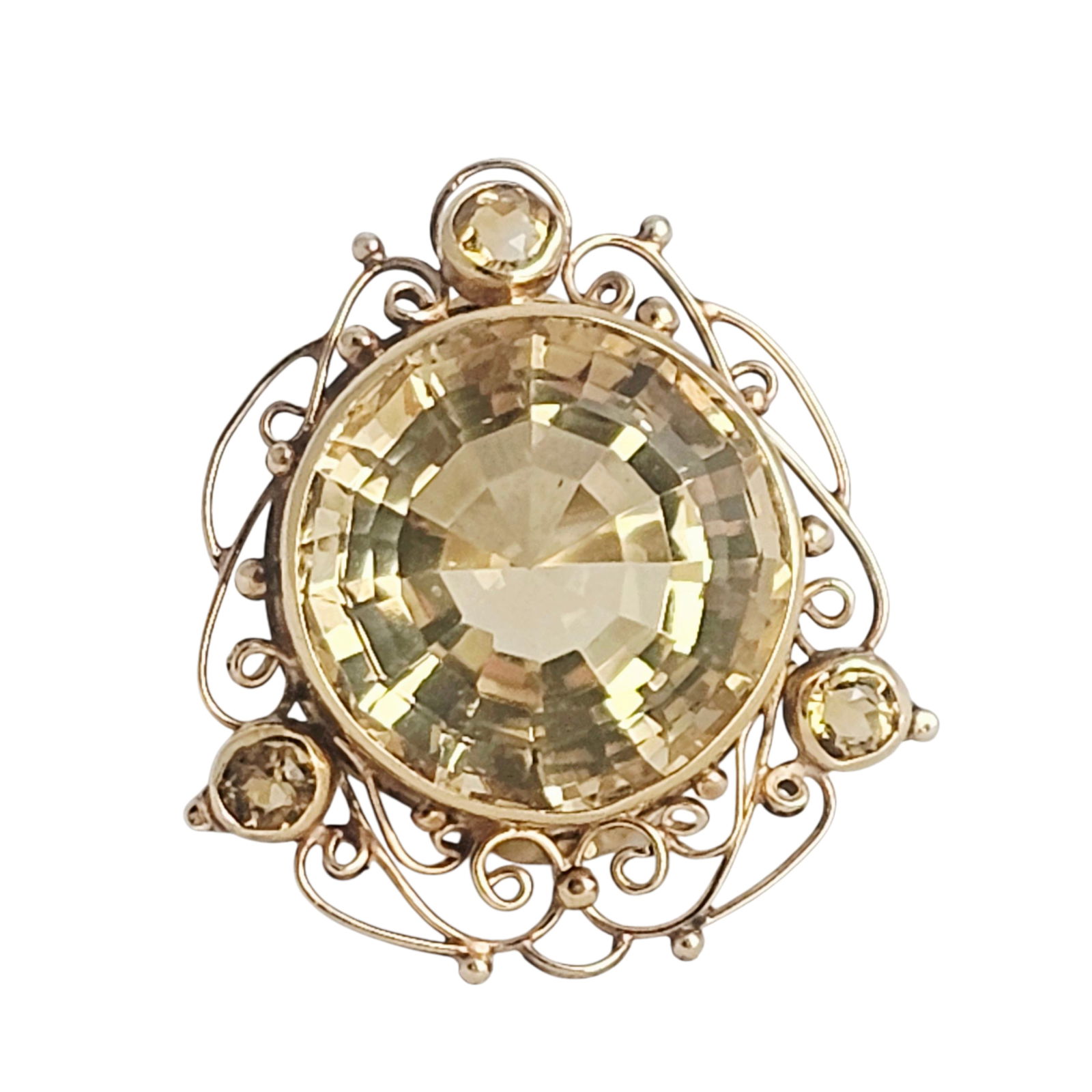 Citrine, 14k Yellow Gold Ring: Centering a round-cut citrine weighing approximately 33.32 cts., accented y three round-cut citrines weighing a total of approximately 0.90 cttw., set in a sinuous 14k yellow gold ring mounting,