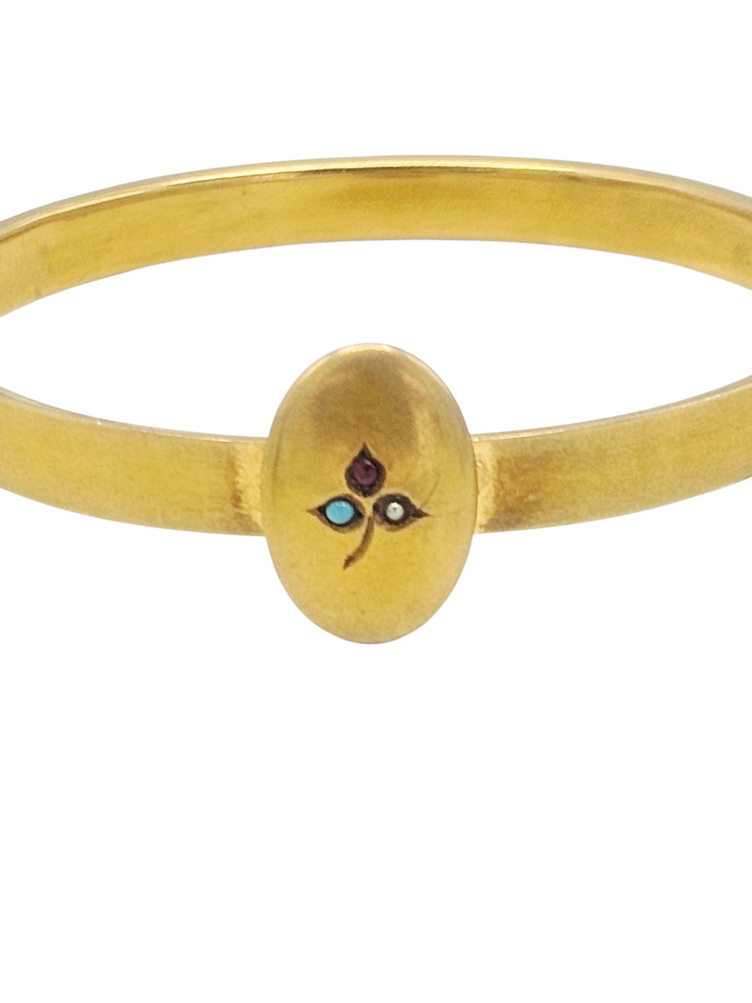 Victorian 14k Yellow Gold Bangle Bracelet: Centering an applied oval plaque featuring one round pearl, ruby and turquoise cabochon, set in a tested-to 14k yellow gold bracelet mounting completed by a push button tongue-and-groove clasp with sa