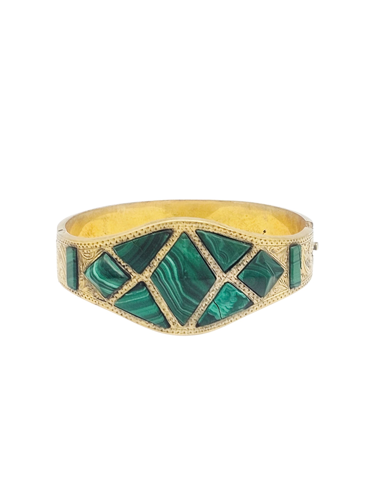 Victorian Malachite, Silver Gilt Bracelet: Featuring varied-shaped malachite set in an engraved, sterling silver gilt hinged bracelet mounting, completed by a tongue-and-groove clasp, inner circumference 7 inches. Gross weight: 27.9 grams.