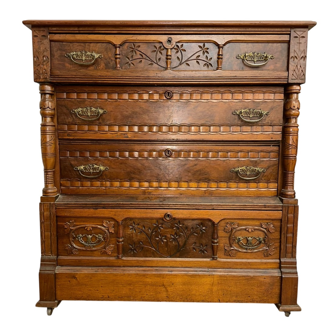 Victorian Eastlake Walnut 4 Drawer Chest of Drawers: Victorian Eastlake walnut 4 drawer chest of drawers. Measures approximately 40 in L x 19 1/2 in D x 40 in H.