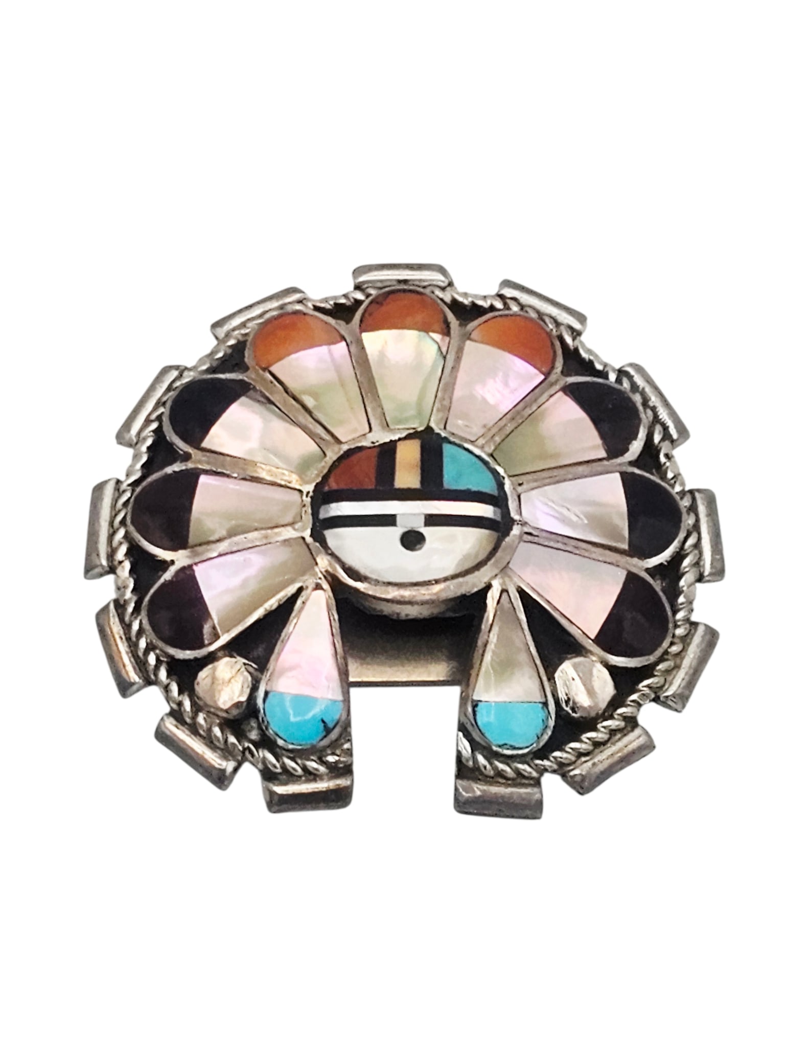 Zuni Multi-Stone 'Sunface,' Silver Bolo, Dexter & Eva Cellicion: Designed as a Zuni 'Sunface,' featuring inlaid mother-of-pearl, turquoise, jet and spiny oyster shell, set in a sterling silver bolo mounting measuring approximately 1.70 x 1.65 inches. Etched