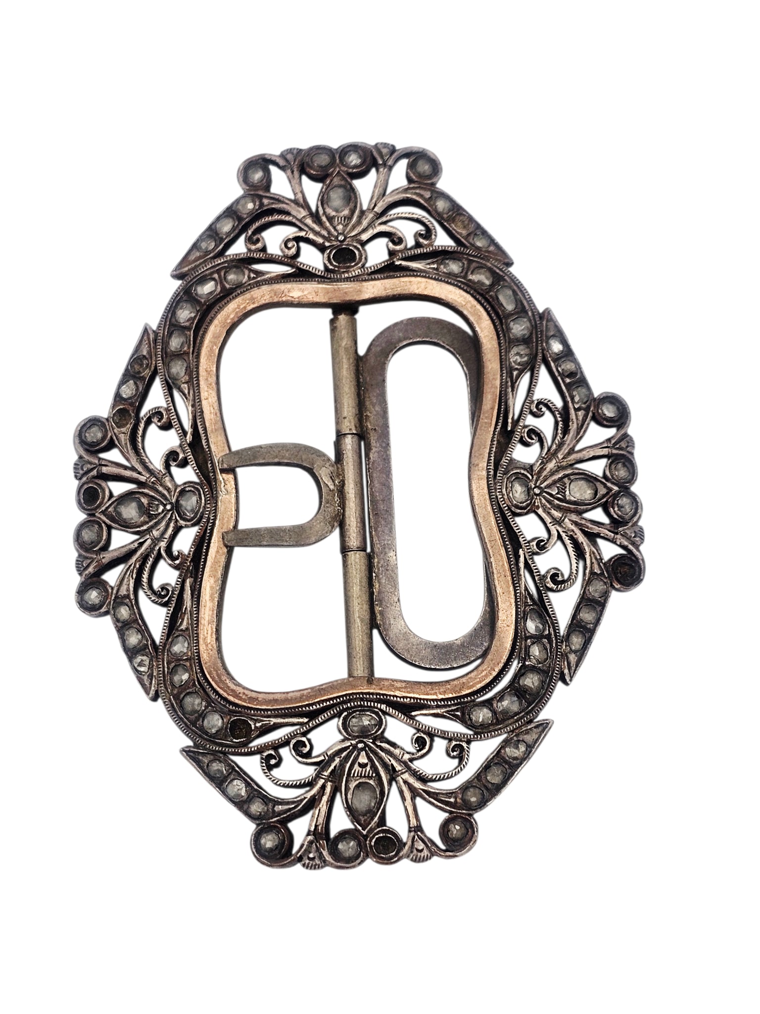 18th Century Silver Buckle: The scrolling silver buckle highlighted with overlaid copper and numerous colorless rose-cut 'stones,' measuring approximately 3.70 x 2.85 inches. Gross weight: 65.1 grams.Note: