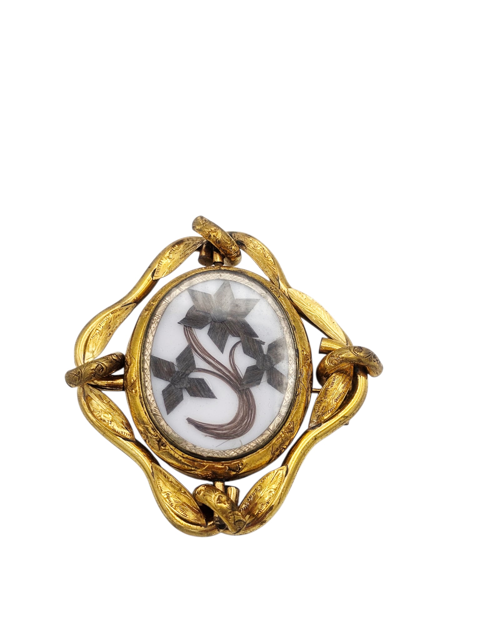 Victorian Hairwork, Gilt Metal Brooch: Featuring hairwork flowers under glass, set in a scrolling, gilt metal pin mounting, reversing to a photograph of a Victorian gentleman and measuring approximately 2.65 x 2.60 inches. Gross