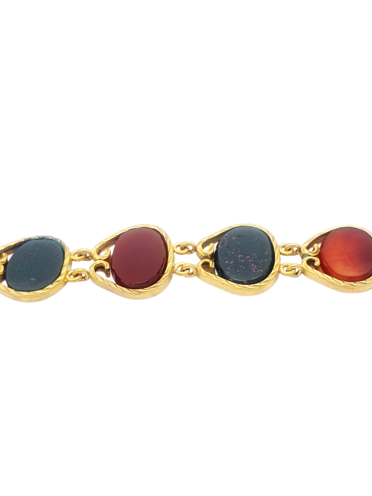 Antique Agate, Gold-Plated Watch Chain: Featuring alternating carnelian agate and bloodstone plaques set in a gold-plated watch chain mounting completed by a T-bar and swivel, 9 3/4 inches. Gross weight: 15.8 grams.
