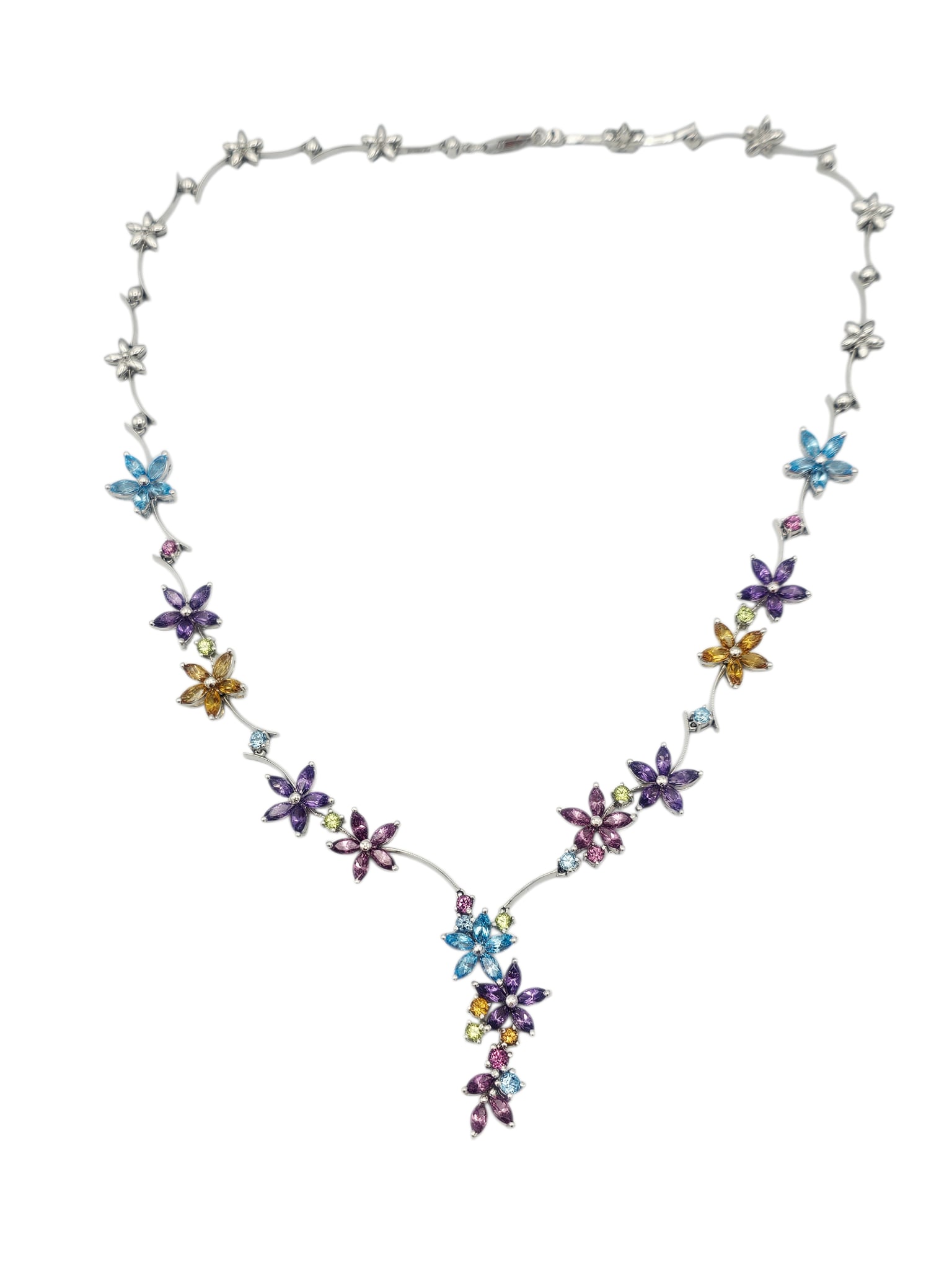 Multi-Stone, 18k White Gold Necklace, Esther Fortunoff: Designed as cascading flowers, the petals composed of marquise-shape amethyst, topaz, peridot and citrine, highlighted by round-cut stones and set in an articulated 18k white gold mounting