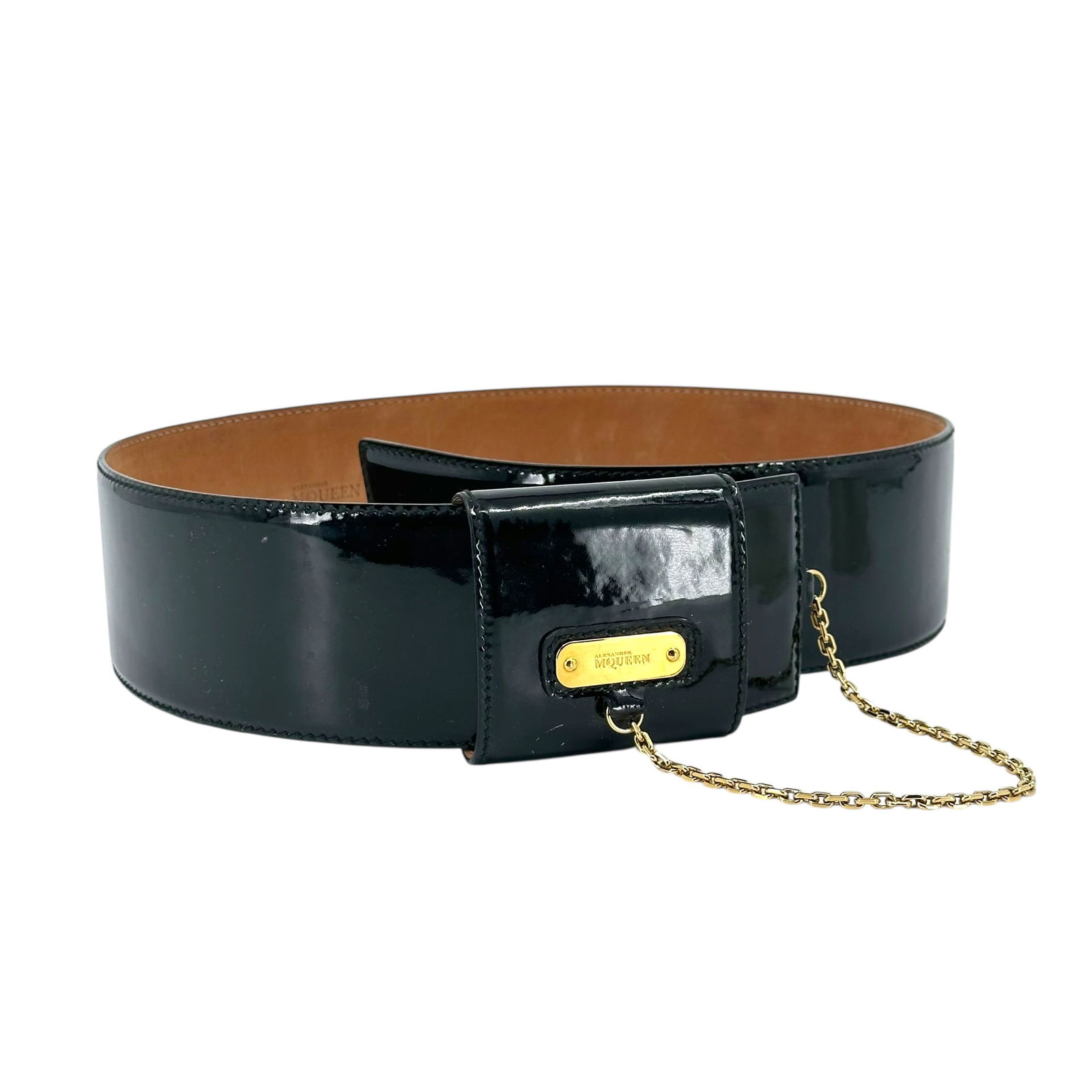 Alexander McQueen Italian Patent Leather Belt: The interior impressed "Alexander McQueen made in Italy 197054-1766-85-34",40"l Absence of a condition report does not indicate that this lot is in perfect condition. Please request a c