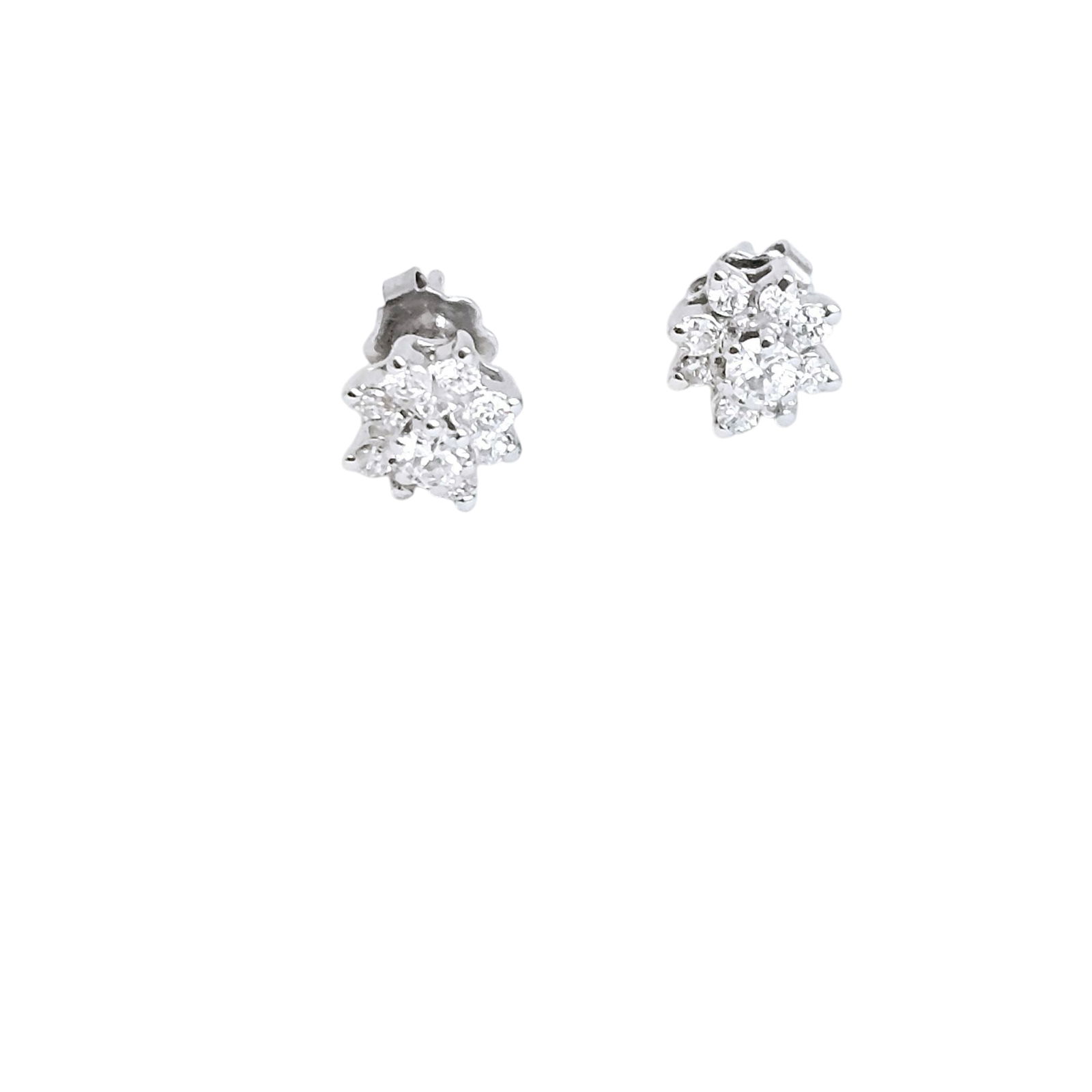 Pair of Diamond, 14k White Gold Earrings: Each designed as a flower, featuring nine round brilliant-cut diamonds weighing a total of approximately 0.30 ctw., set in a 14k white gold post-style earring mounting. Total diamond carat weight for