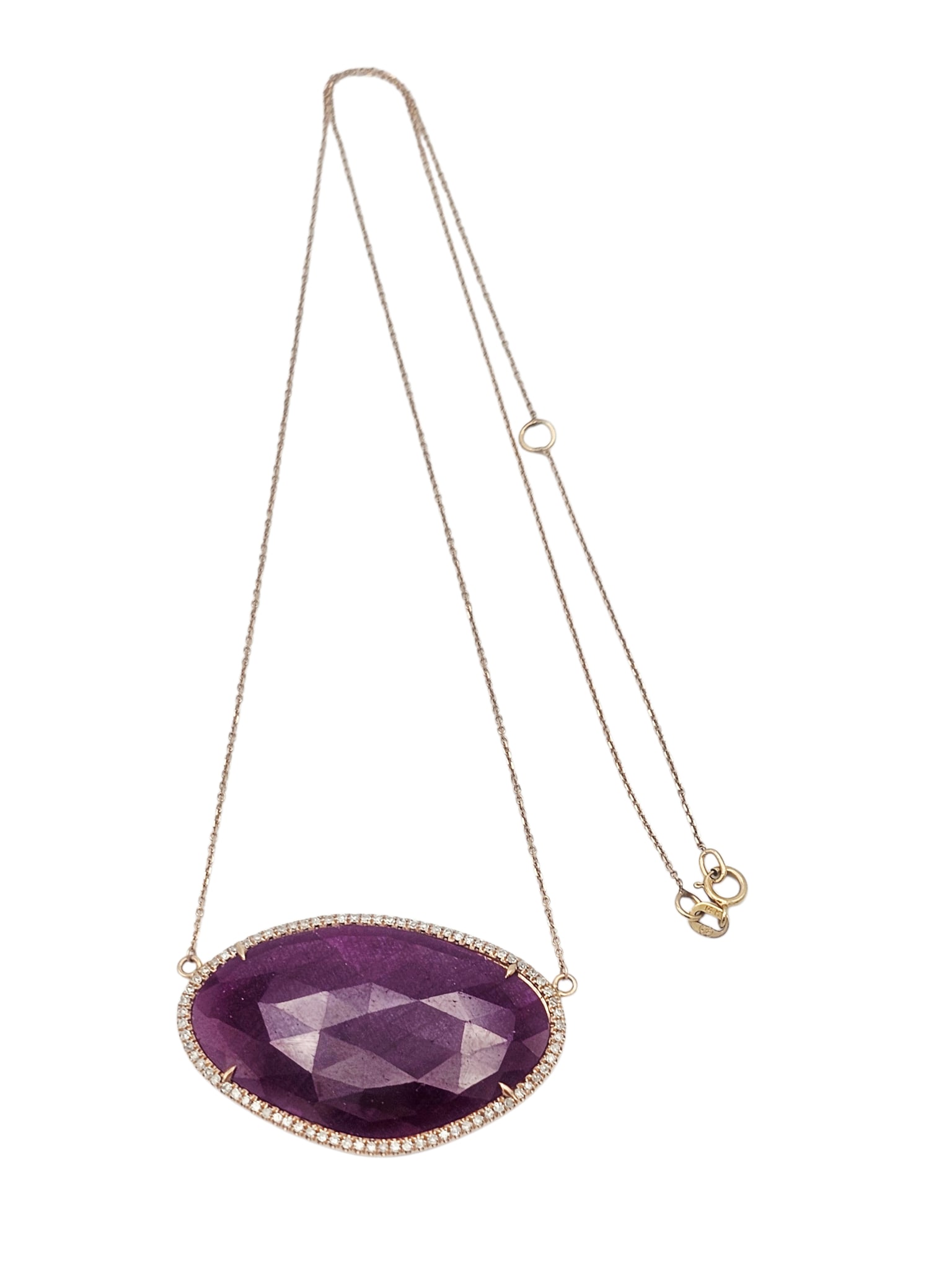 Ruby, Diamond, 14k Rose Gold Necklace: Featuring a faceted, abstract-shape ruby measuring approximately 33.23 x 20.75 x 3.46 mm, accented by seventy-nine round brilliant-cut diamonds weighing a total of approximately 0.55 ctw., set in a