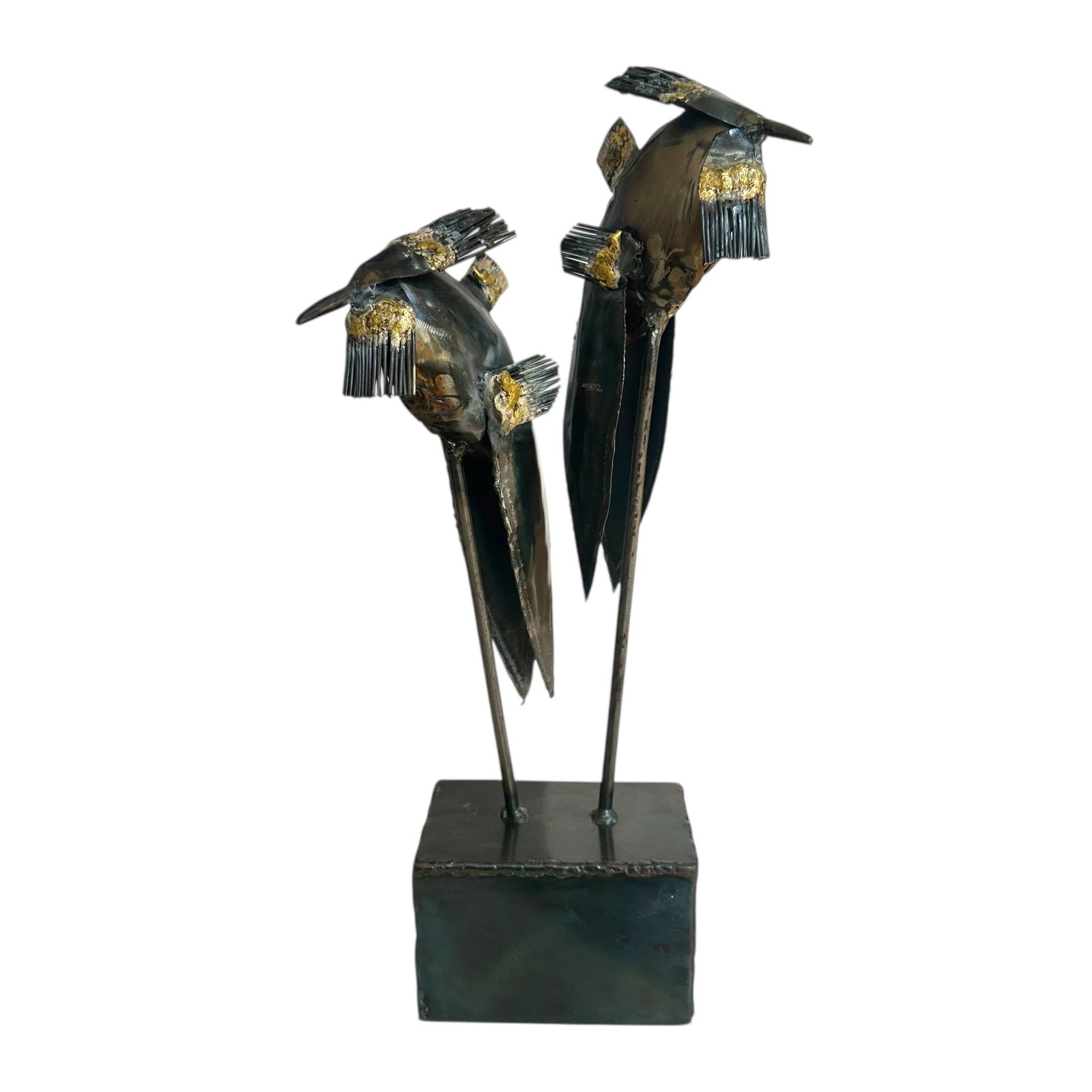 In the Style of Sergio Bustamante, Hummingbird Sculpture, Unsigned: In the style of Sergio Bustamante, metal sculpture of two hummingbirds on a metal plinth.