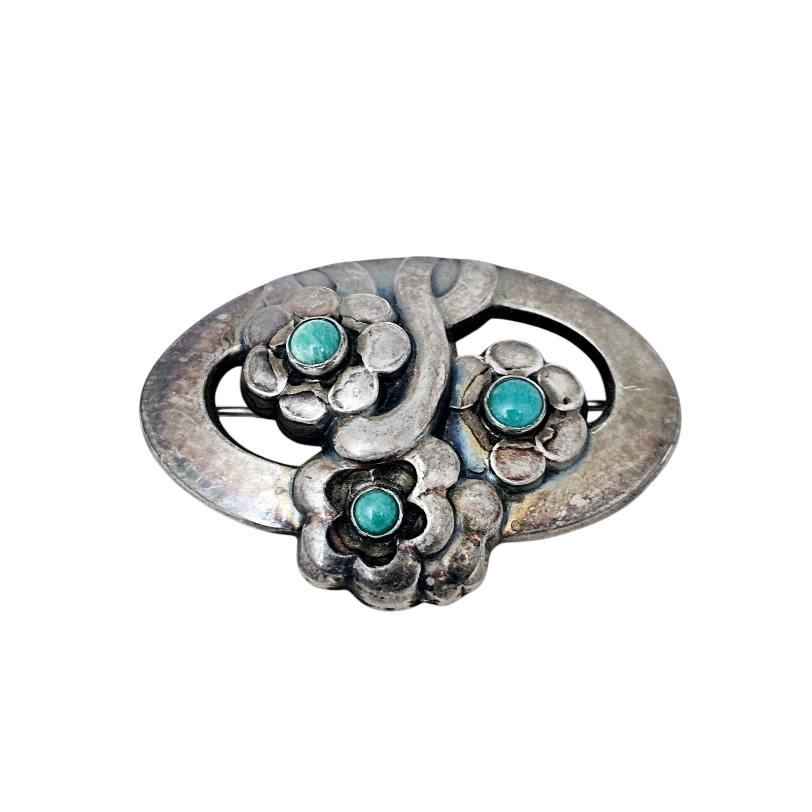 Amazonite, Sterling Silver Pin No. 28, Georg Jensen: Designed in a foliate motif, the three flowers each centering one round amazonite cabochon, set in a sterling silver pin mounting measuring approximately 1.90 x 1.30 inches. Marked "Georg