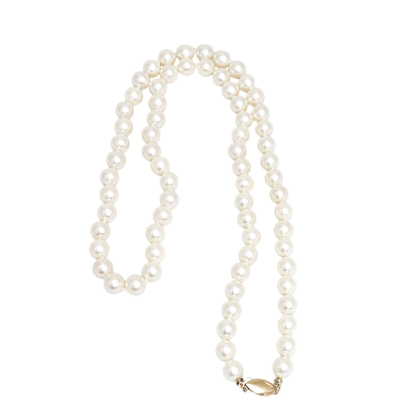 Cultured Pearl, 14k Yellow Gold Necklace: Composed of eighty-seven round and slightly off-round cultured pearls, each measuring approximately 7.0 mm, completed by a hook and box clasp forming a 26 inch necklace. Gross weight: 46.6