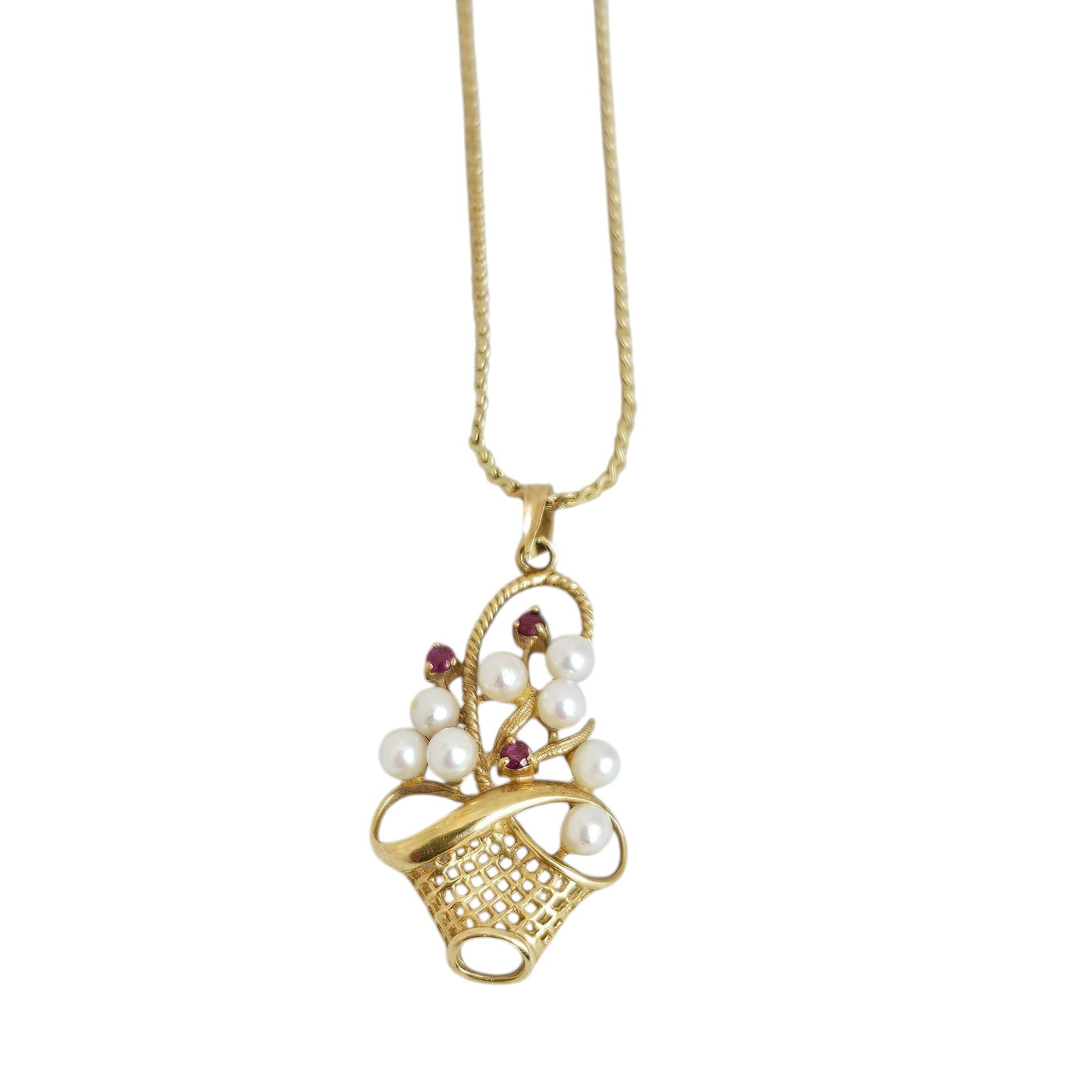 Cultured Pearl, Ruby, 14k, Gold-Filled Jardinere Necklace: Designed as a basket, featuring eight round cultured pearls accented by three single-cut rubies weighing a total of approximately 0.06 cttw., set in a 14k yellow gold mounting suspended by a