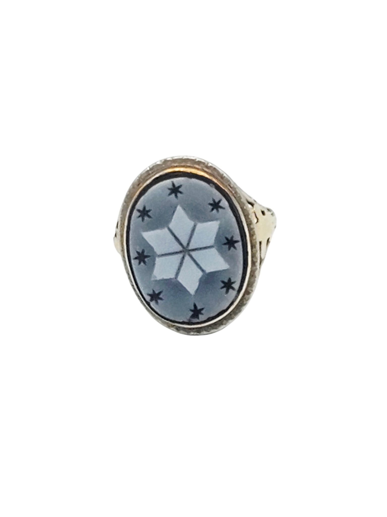 Antique Hardstone, 14k Yellow Gold Ring: Centering an oval hardstone plaque carved as stars, set in a 14k yellow gold filigree ring mounting, size 2 3/4. Gross weight: 3.2 grams.
