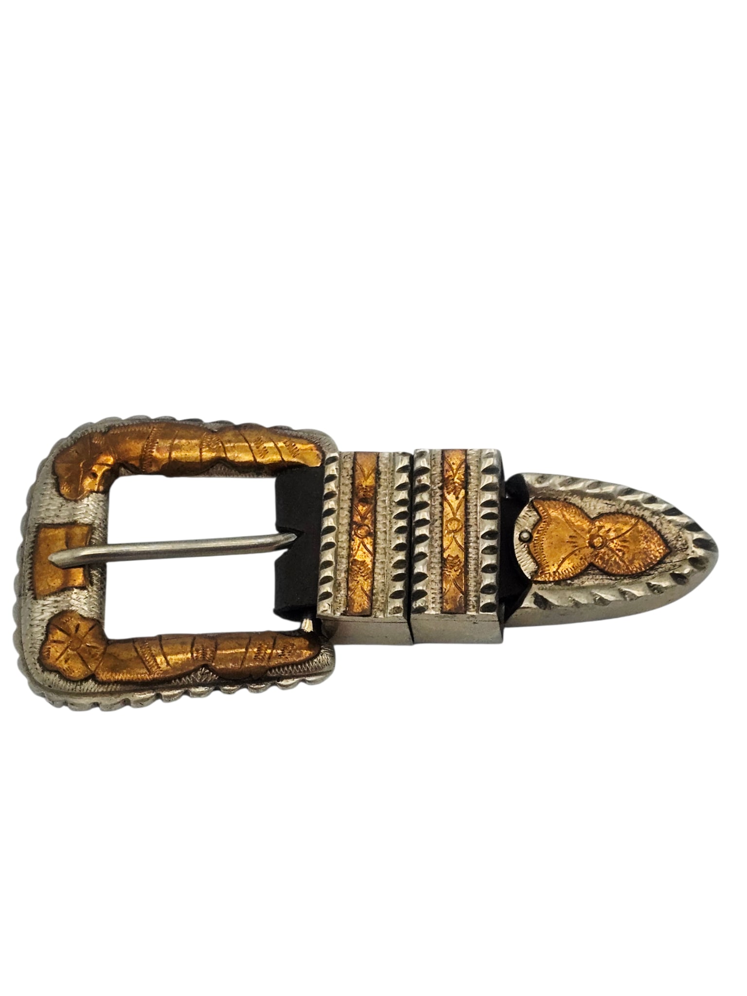 Taxco Sterling Silver, Copper Belt Buckle: The sterling silver buckle with two belt loops and tip, accented by overlaid copper and engraving, joined by a leather belt segment. Marked; 'Sterling, Taxco, 925.' Gross weight: 69.4 grams. A