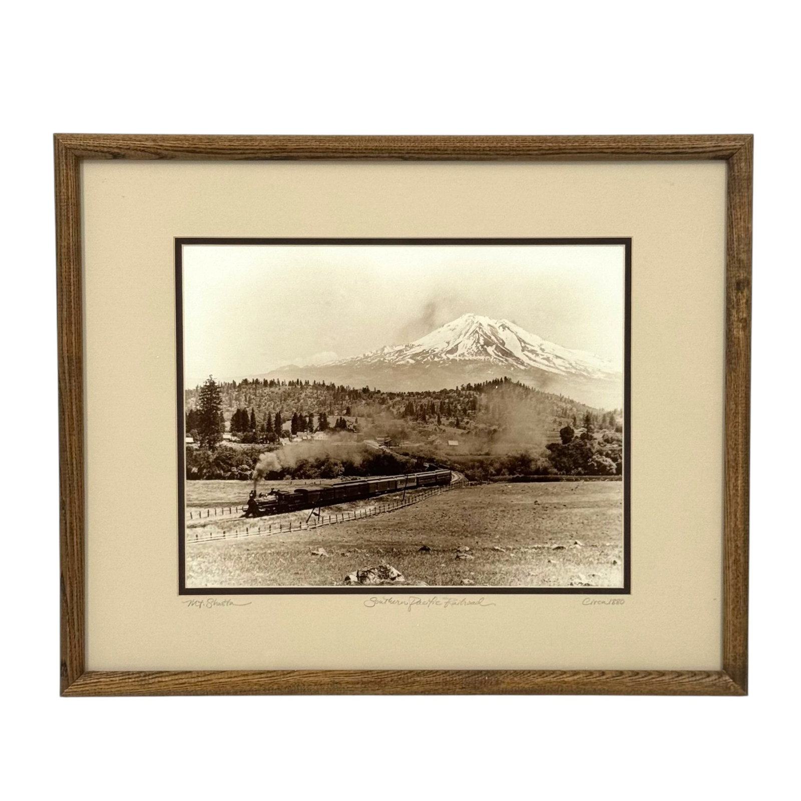 Vintage Southern Pacific Railroad Photographic Print: Vintage Southern Pacific Railroad photographic print, matted in frame, pencil inscribed "Mt. Shasta" (lower left), "Southern Pacific Railroad" (center), and "Circa 1880"