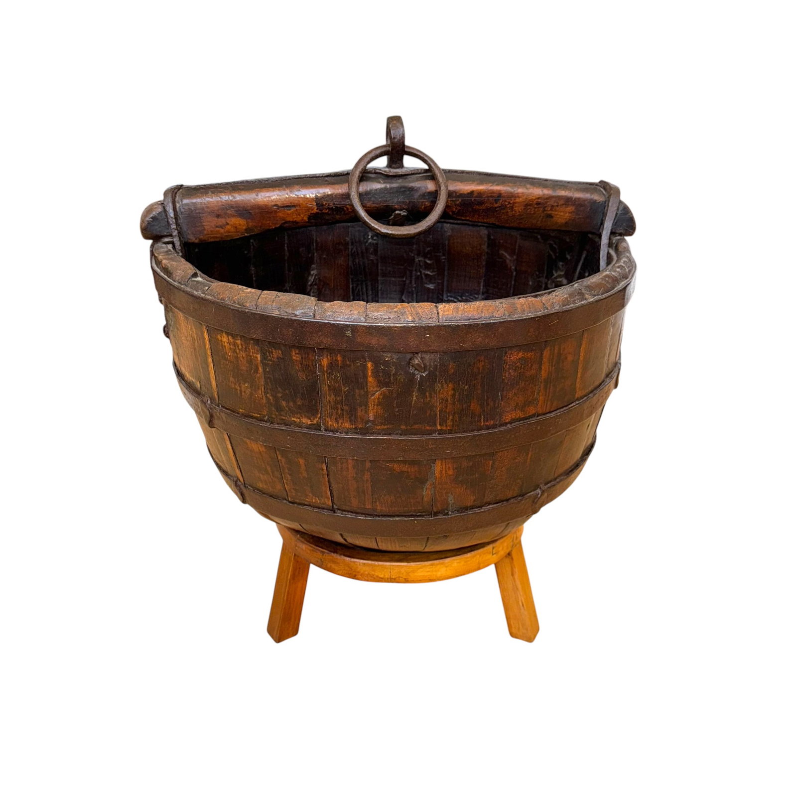 Asian Grain or Water Basket: As Asian wood grain or water basket, featuring heavy iron banding and ring, tapered wood staves in a sunburst pattern culminating in a tapered basket design, late 19th - early 20th century, measures