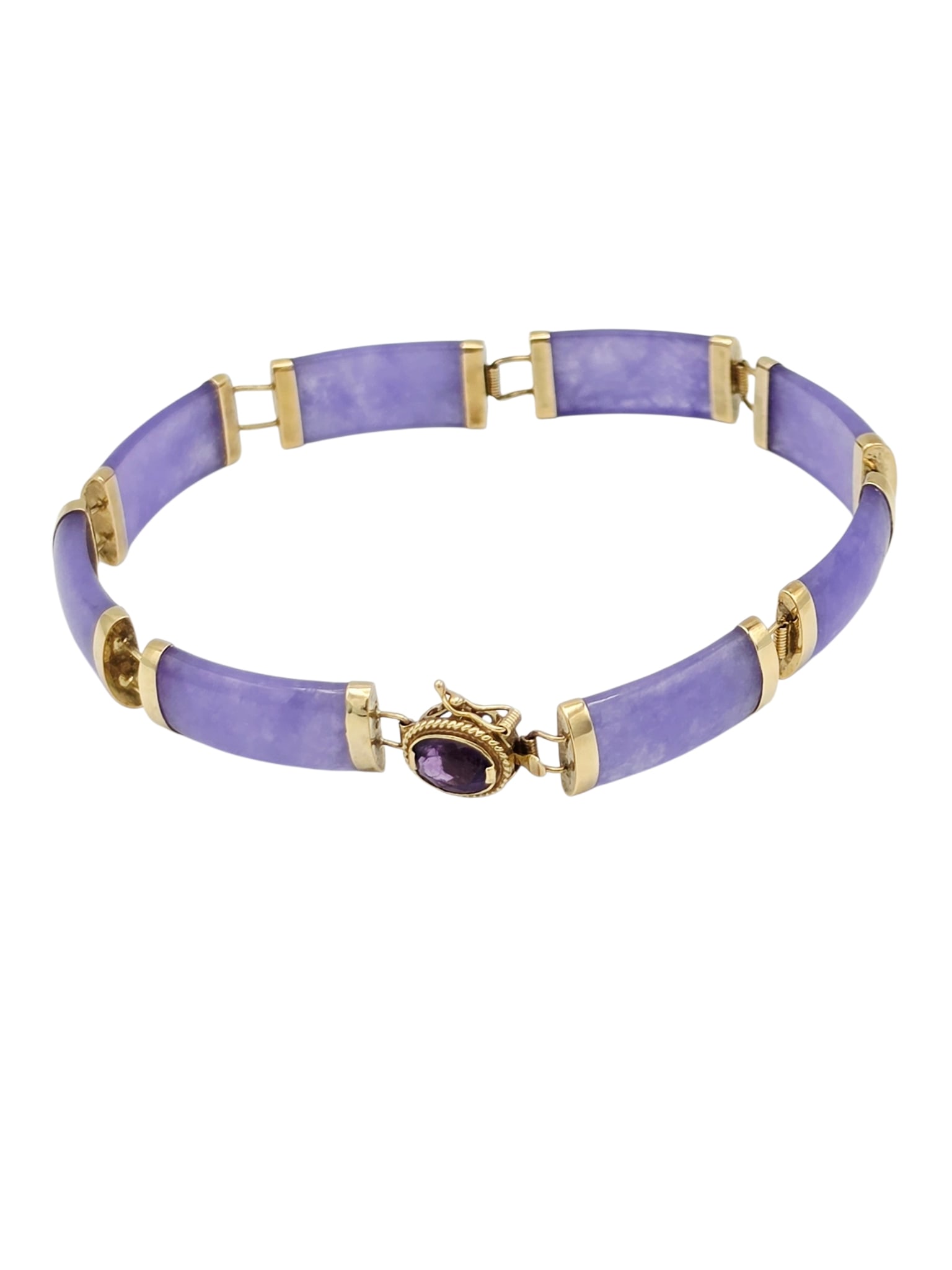 Jade, Amethyst, 14k Yellow Gold Bracelet: Featuring eight arched lavender jade segments set in an articulated 14k yellow gold mounting and completed by an amethyst, 14k yellow gold tongue-a-groove box clasp with figure-eight safety, forming