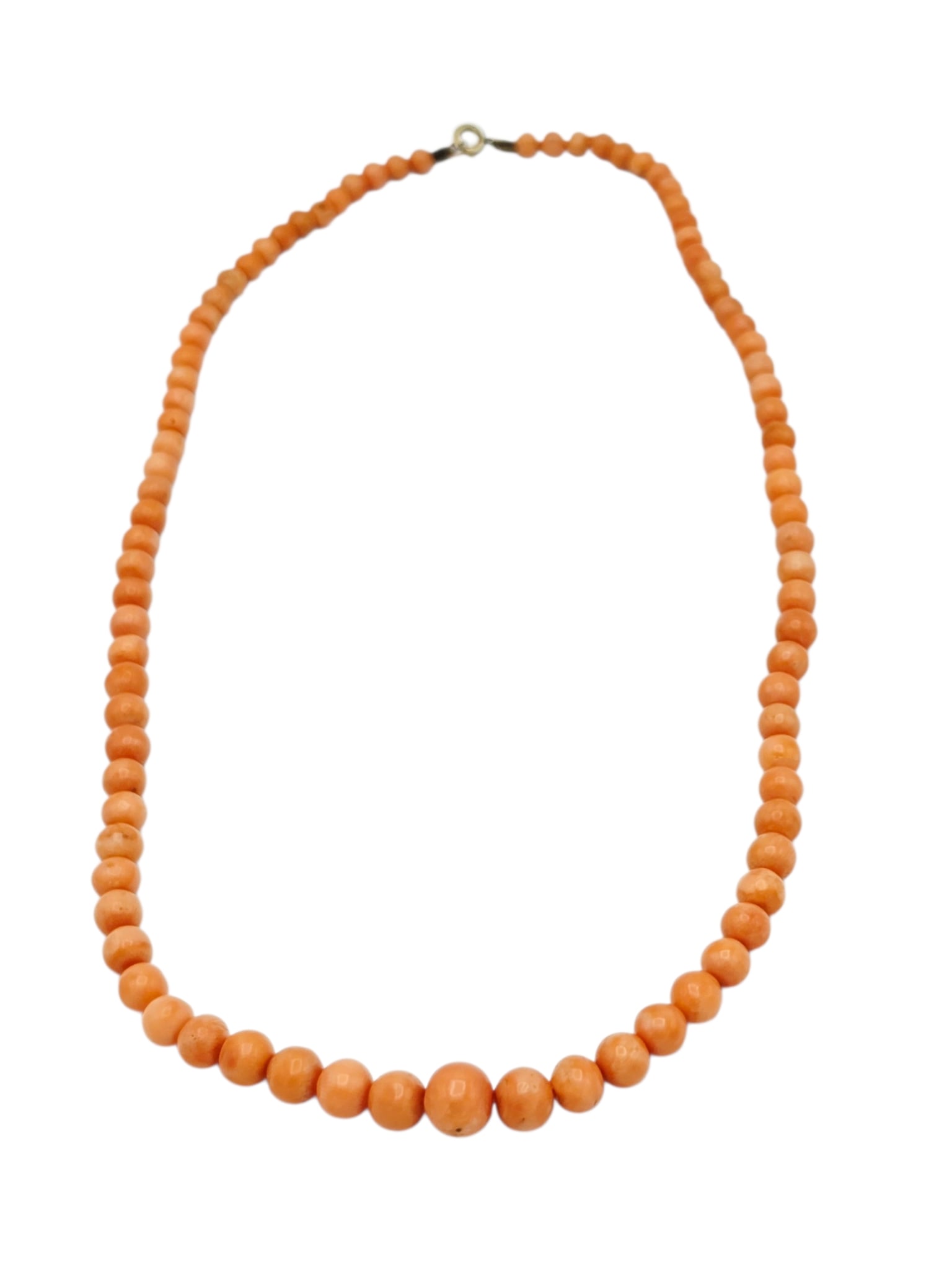 Antique Graduated Coral Bead Necklace: Comprised of eighty-seven near round coral beads, graduating from approximately 8.8 to 4.6 mm, completed by a gold-tone spring ring clasp forming a 19 inch necklace. Gross weight: 24.2 grams.