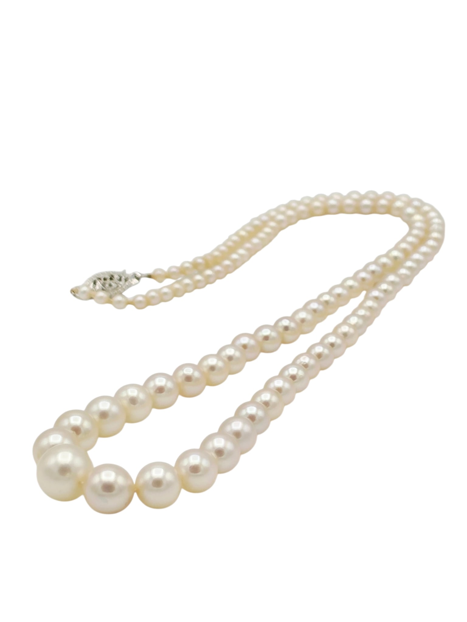 Graduated Cultured Pearl, 14k Necklace: Composed of one hundred eight round cultured pearls, graduated from approximately 8.5 to 5.3 mm, completed by a 14k white gold hook and box clasp forming a 17 3/4 inch
