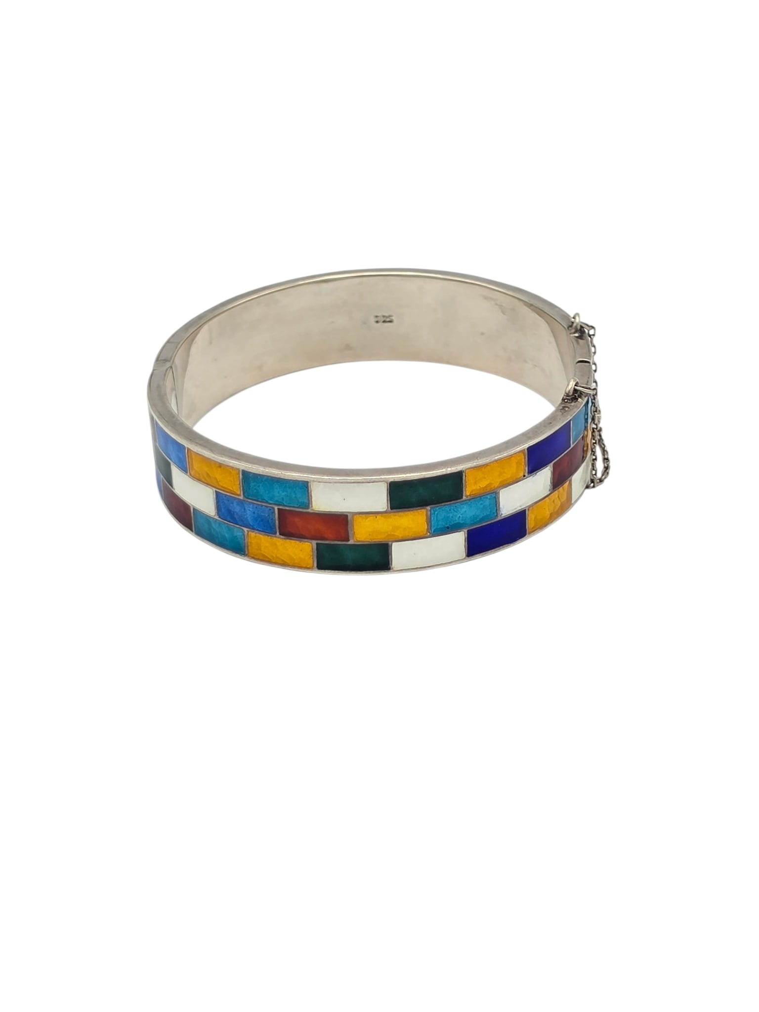 Enamel, Sterling Silver Bangle Bracelet: Featuring numerous rectangles of vibrant polychrome enamel, set in a hinged, sterling silver bracelet mounting measuring approximately 15.8 mm in width, completed by push-button tongue-and-groove clas