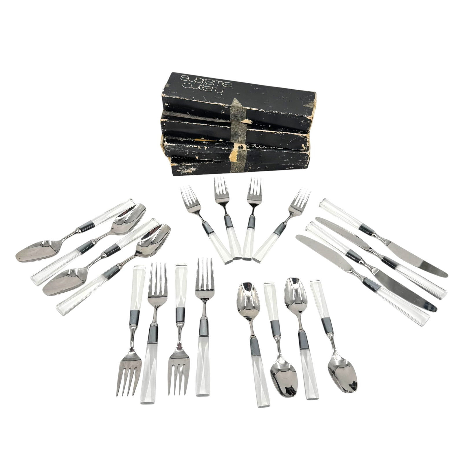 (Lot of) 4 Five Piece Supreme Cutlery Flatware Set: (Lot of) 4 five-piece Supreme cutlery acrylic handle flatware set, including (each place setting) one dinner fork, one salad fork, one dinner knife, one soup spoon, and one teaspoon. Each place settin