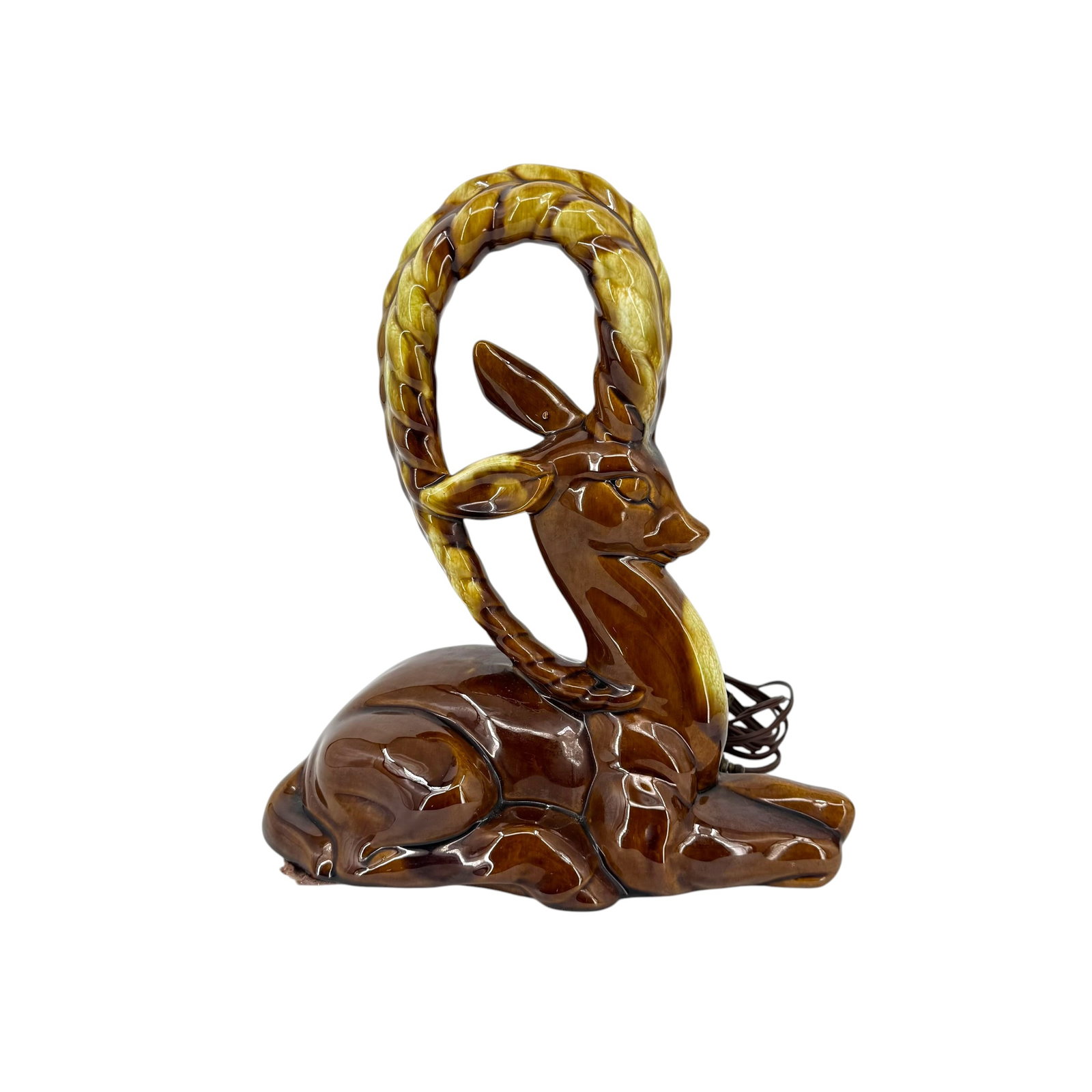 Mid-Century Modern "Kudu" Gazelle TV Lamp: Mid-century modern ceramic TV lamp in the shape of a gazelle, in a green and brown glaze, with original cord and light socket. Measures approximately 12 in H.
