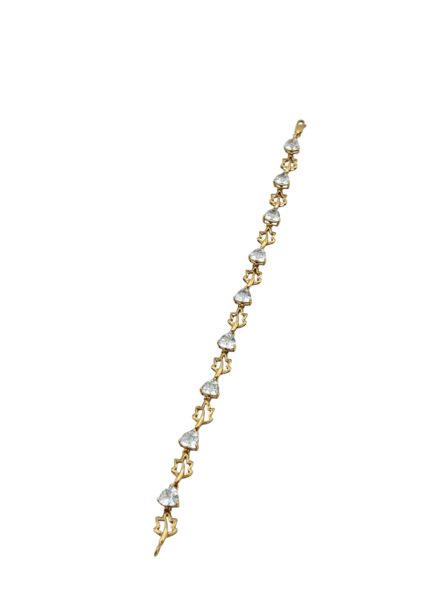 Aquamarine, 10k Yellow Gold Bracelet: Featuring nine triangle-shape aquamarines weighing a total of approximately 6.30 cts., set in an articulated, 10k yellow gold bracelet mounting completed by a lobster claw clasp forming a 7 inch