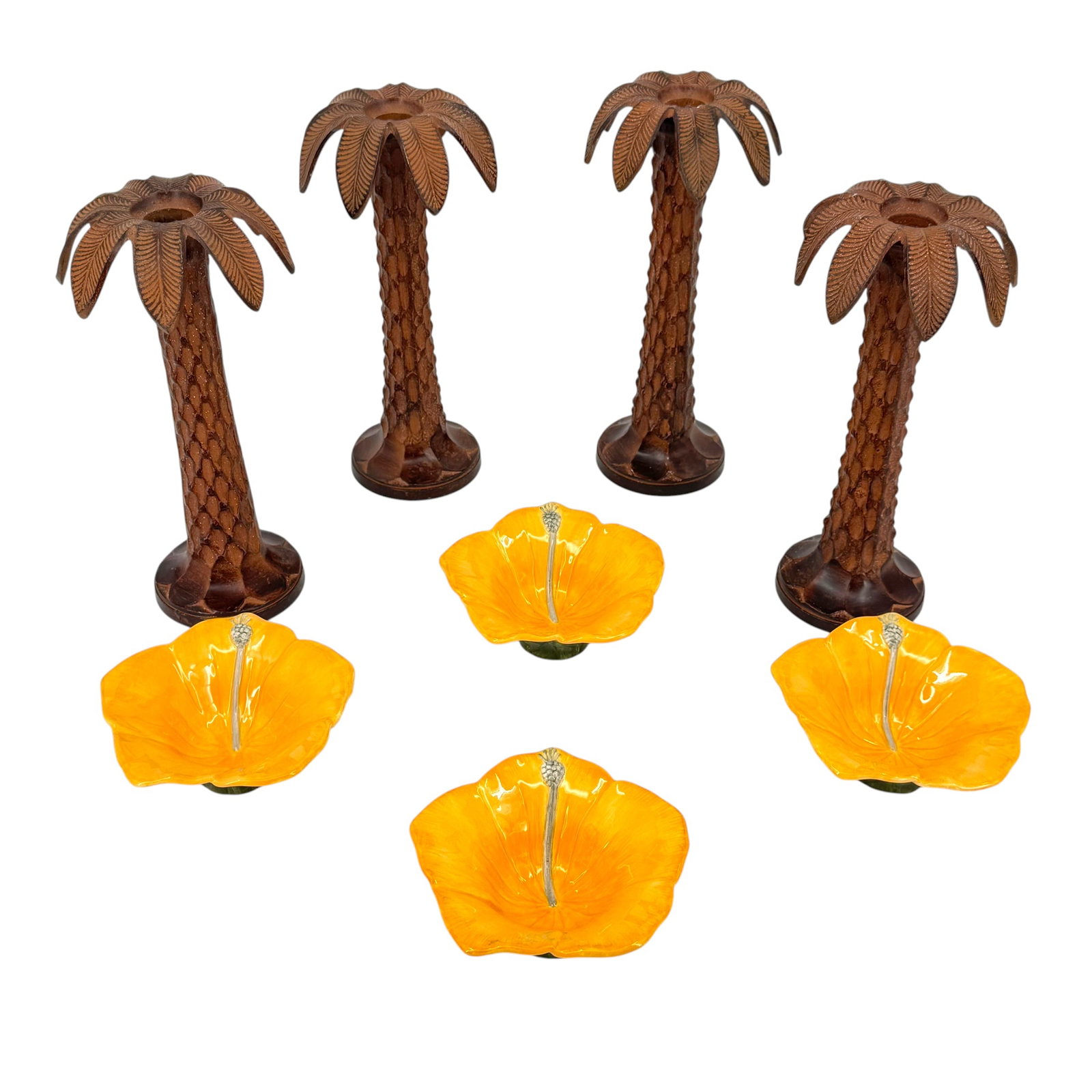 (Lot of) 8 Tommy Bahama "Island Life" Decor Group: (Lot of) 8 Tommy Bahama "Island Life" decor group, featuring 4 Tommy Bahama hibiscus flower bowls, each signed underneath, together with 4 painted metal palm tree taper candleholders wi