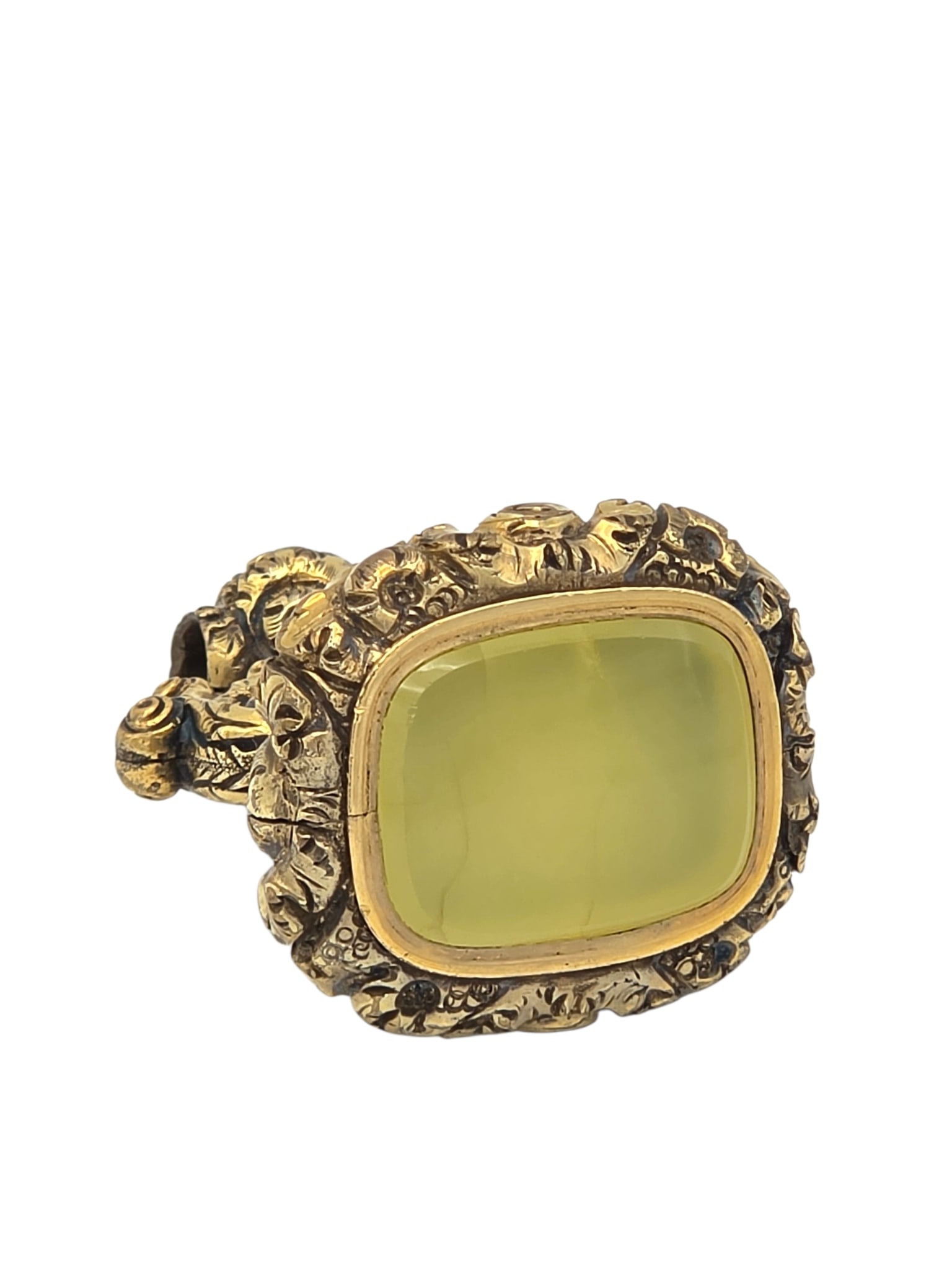 Georgian Chalcedony, Gilt Metal Fob: The ornate repousse gilt metal completed by a chalcedony plaque, forming a watch fob measuring approximately 2.00 x 1.43 inches. Gross weight: 55.3 grams.
