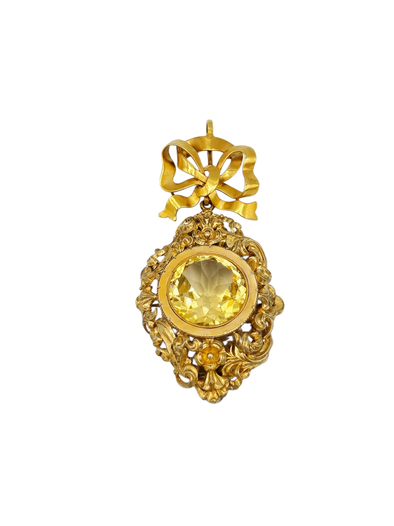 Victorian Glass, 14k Pendant: Centering faceted round glass, set in a repousse 14k yellow gold drop, suspended by a detachable 14k yellow gold bow-form mounting forming a pendant measuring approximately 2.90 x 1.40 inches.