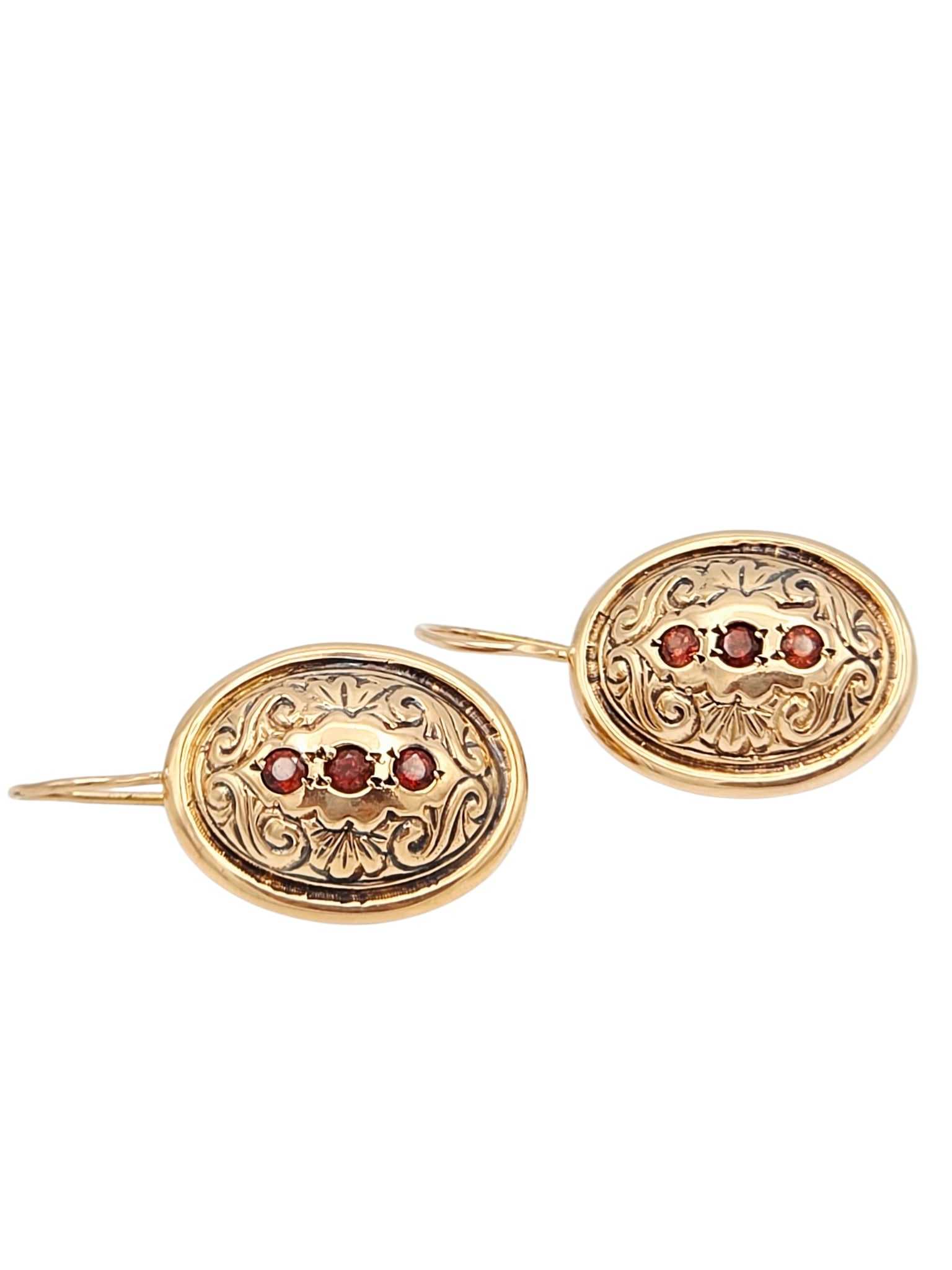 Pair of Spessartine Garnet, 14k Rose Gold Earrings: Each featuring three round-cut spessartine garnets weighing a total of approximately 0.18 ctw., set in a repousse, 14k rose gold earring mounting measuring approximately 1 1/8 inches in length. Gross 