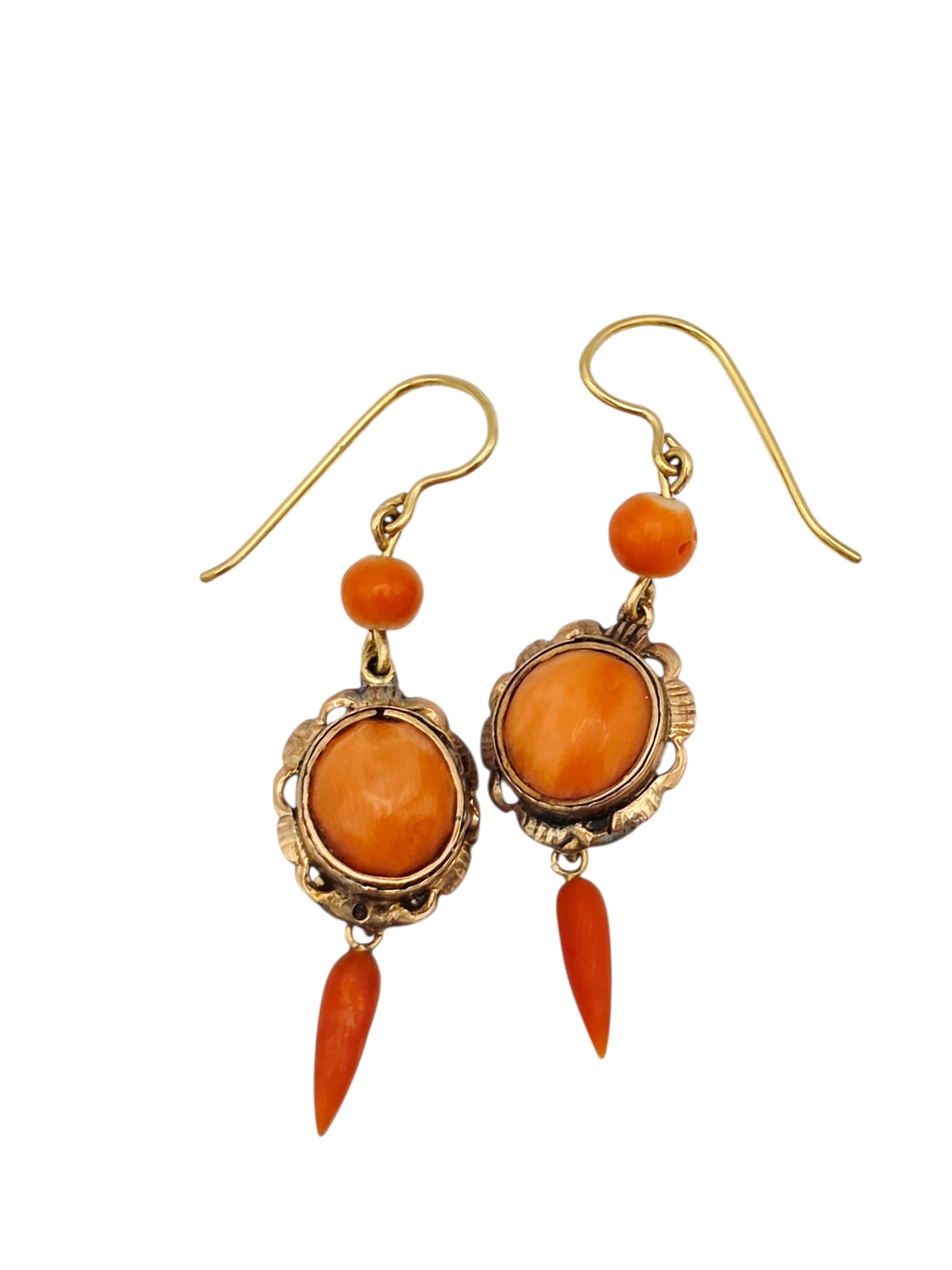 Pair of Antique Coral, 14k Earrings: Each centering one oval coral cabochon topped by one coral bead and suspending one coral drop, set in a scalloped, 14k rose gold mounting suspended by 14k yellow gold ear wires, total length