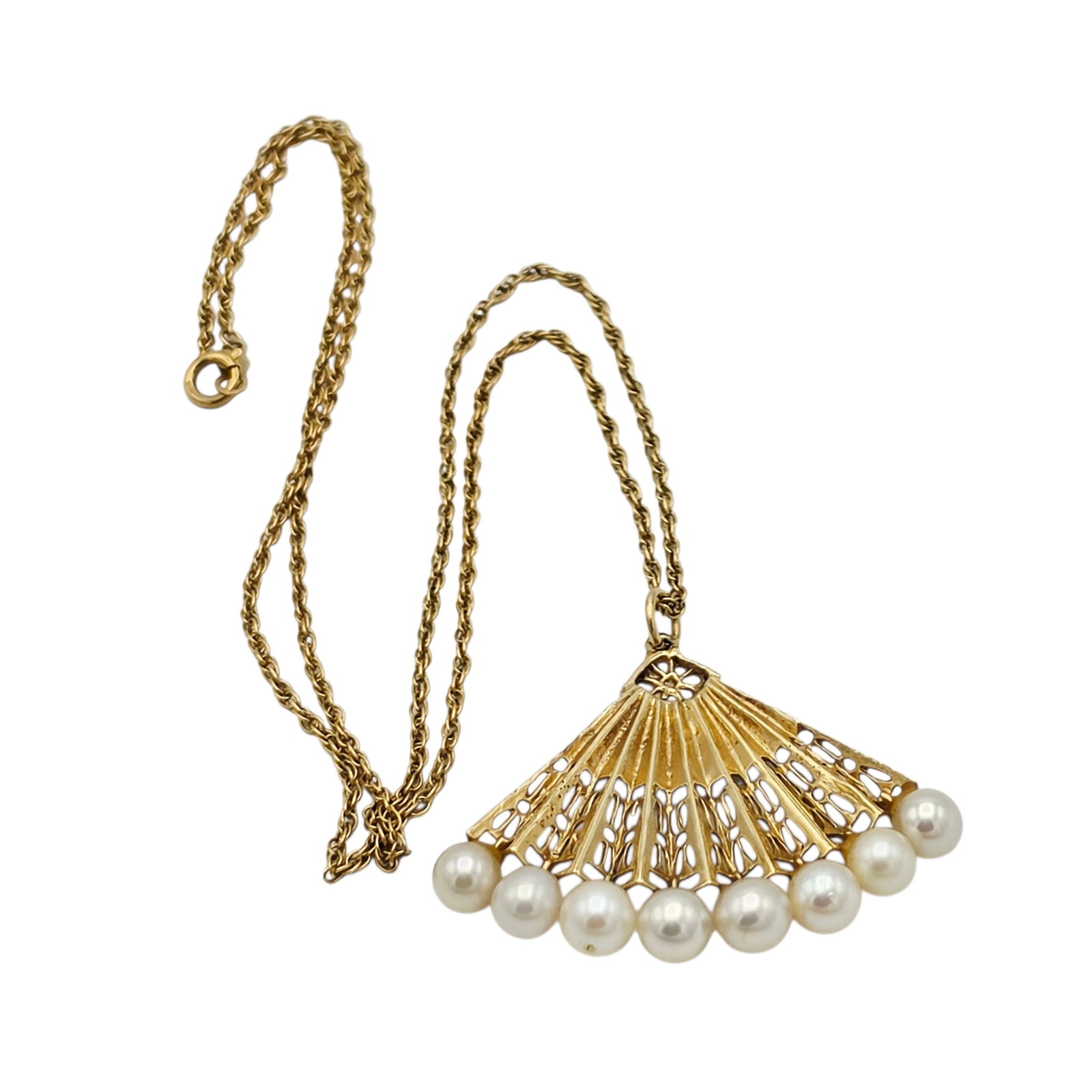 Cultured Pearl, 14k Yellow Gold 'Fan' Necklace: Designed as a fan tipped by eight round cultured pearls, each measuring approximately 5.0 mm, set in a 14k yellow gold pendant mounting suspended by a 14k yellow gold Singapore-link chain forming a 20