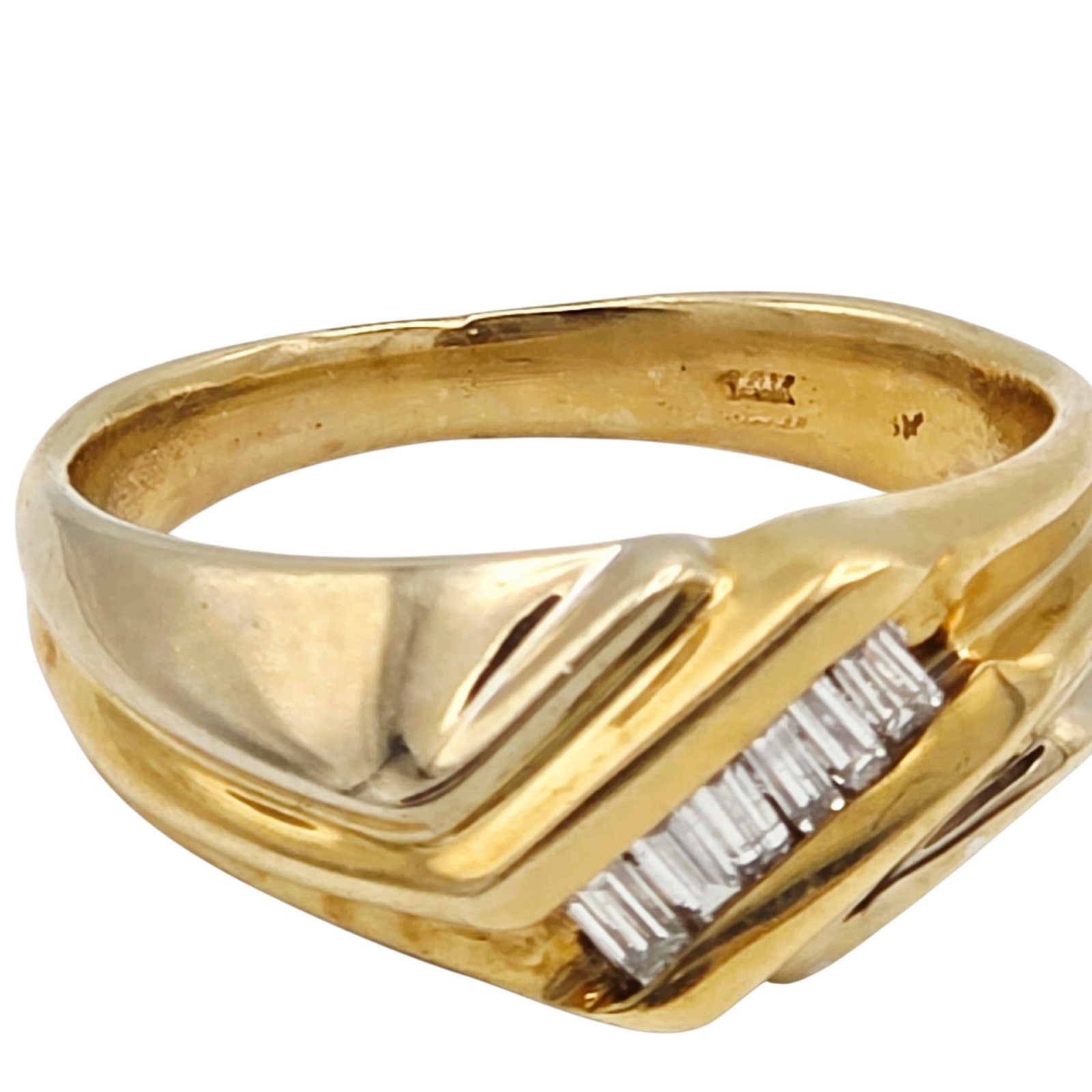 Diamond, 14k Yellow Gold Ring: Featuring six baguette-cut diamonds weighing a total of approximately 0.25 ctw., set in a 14k yellow gold ring mounting, size 7. Gross weight: 9.8 grams.