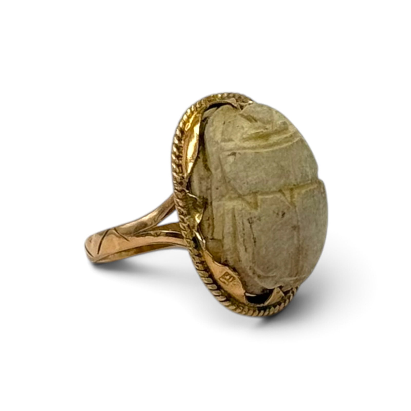 Scarab, 14k Yellow Gold Ring: Featuring a faience scarab, set in a 14k yellow gold ring mounting, size 6. With Egyptian marks. Gross weight: 4.2 grams.