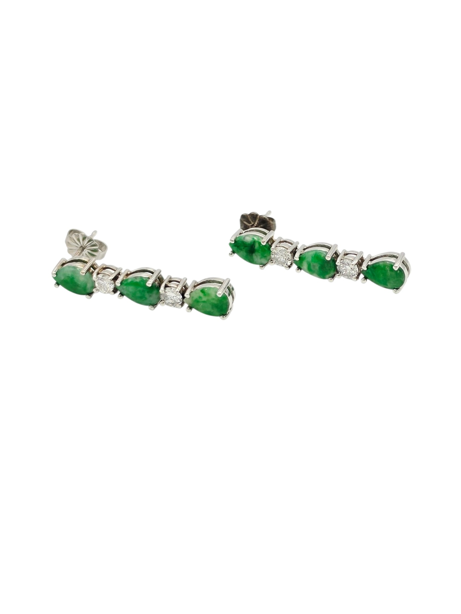 Pair of Jade, Diamond, 14k White Gold Earrings: Each featuring three pear-shaped jade cabochons interspaced by two round-brilliant-cut diamonds weighing a total of approximately 0.30 ctw., set in a 14k white gold earring mounting measuring