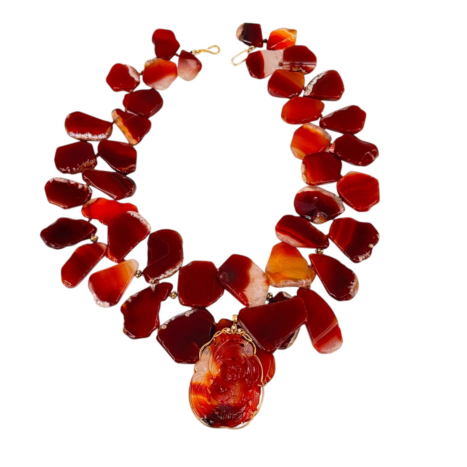 Agate, Diamond, 14k Yellow Gold, Metal Necklace: Featuring a carved agate Buddha, accented by (3) round-cut diamonds, set in a 14k yellow gold frame, measuring approximately 58 x 40 x 9 mm, suspended from flat irregular agate and metal beads,