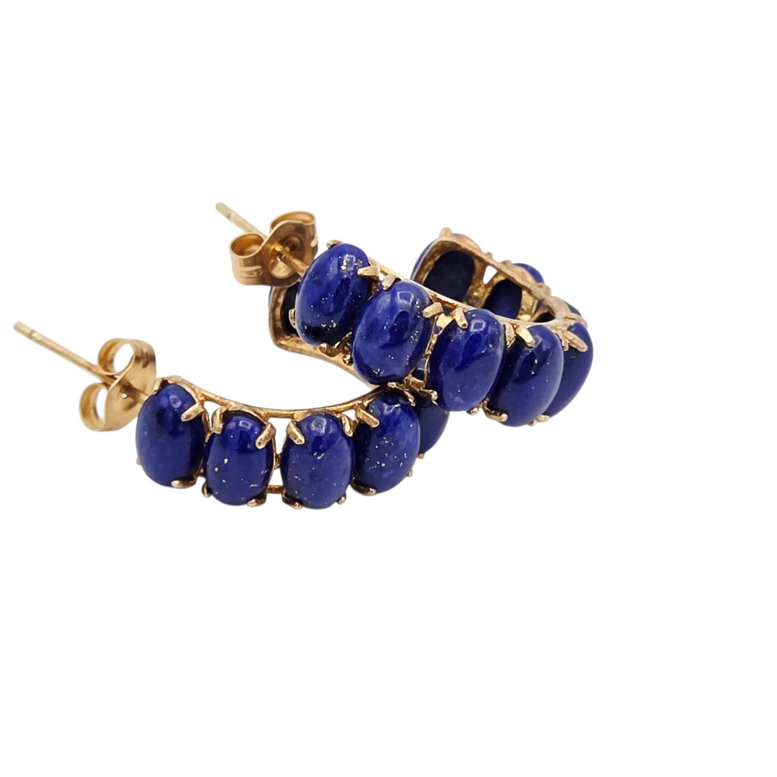 Pair of Lapis Lazuli, 14k Yellow Gold Earrings: Each featuring eight oval lapis lazuli cabochons, set in a 14k yellow gold demi-hoop style earring mounting measuring approximately 0.75 inches (19.0 mm) in length. Gross weight: 3.3 grams.