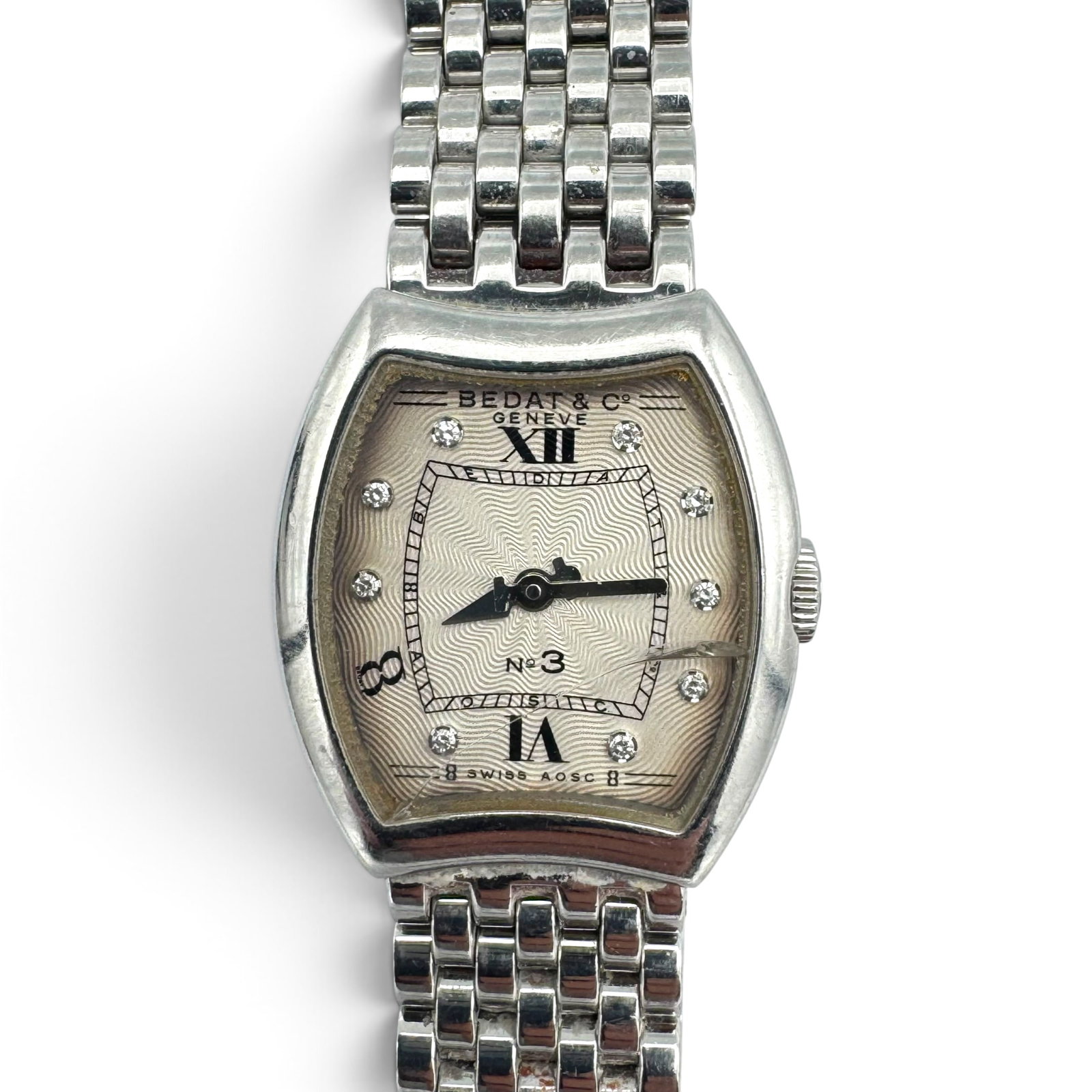 Bedat & Co. Stainless Steel 'No 3' Wristwatch, Ref. 304: DIAL: Tonneau, silvered guilloche,Roman numeral and diamond hour chapters, black inner minutes, silvered spade and baton hands, Bedat & Co., Swiss, A.O.S.C. MOVEMENT: Quartz (case not opened).