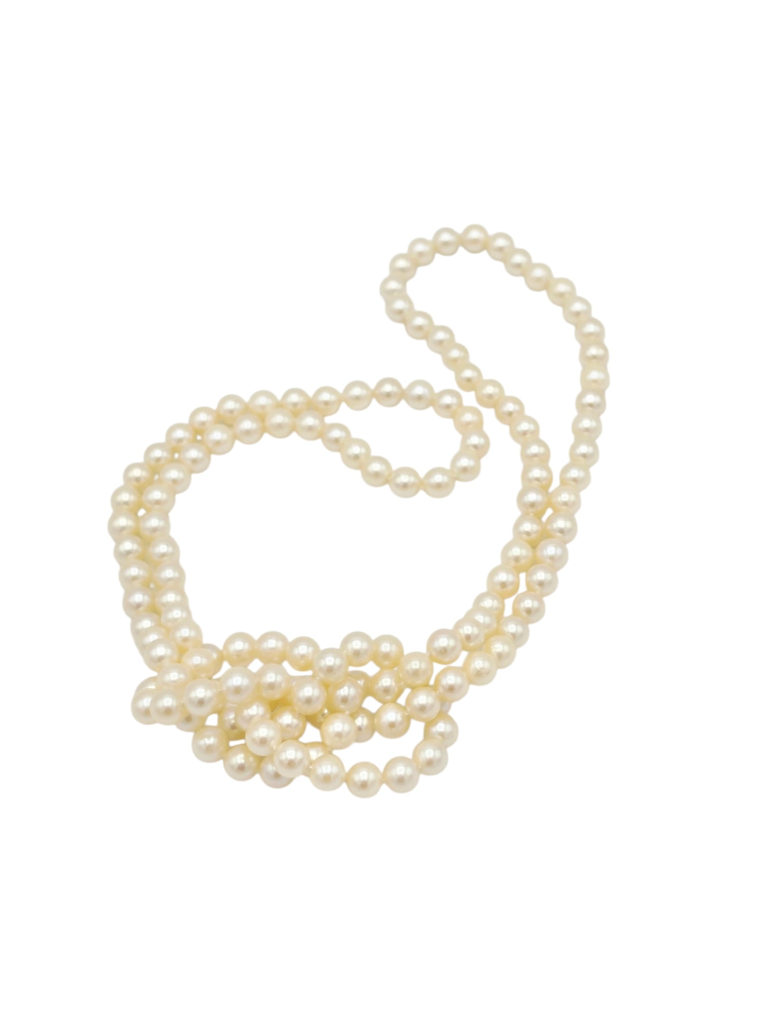 Cultured Pearl Necklace: Composed of two hundred thirty-five round cultured pearls, each measuring approximately 5.8 mm, forming a continuous 31 inch necklace. Gross weight: 36.1 grams.