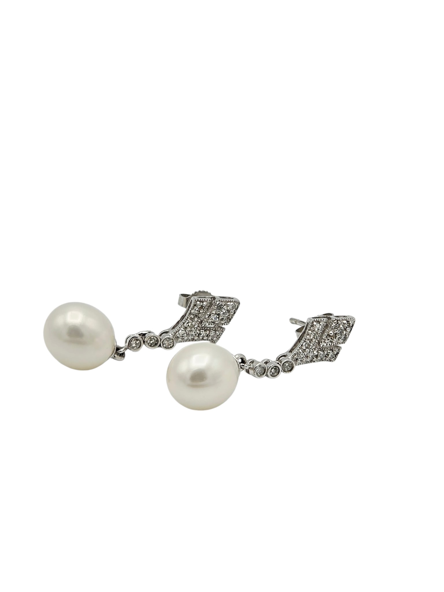 Pair of Diamond, Cultured Pearl, 14k White Gold Earrings: Featuring one baroque cultured freshwater pearl measuring approximately 10.9 x 9.0 mm, suspended by an articulated, 14k white gold mounting highlighted by fifteen single-cut