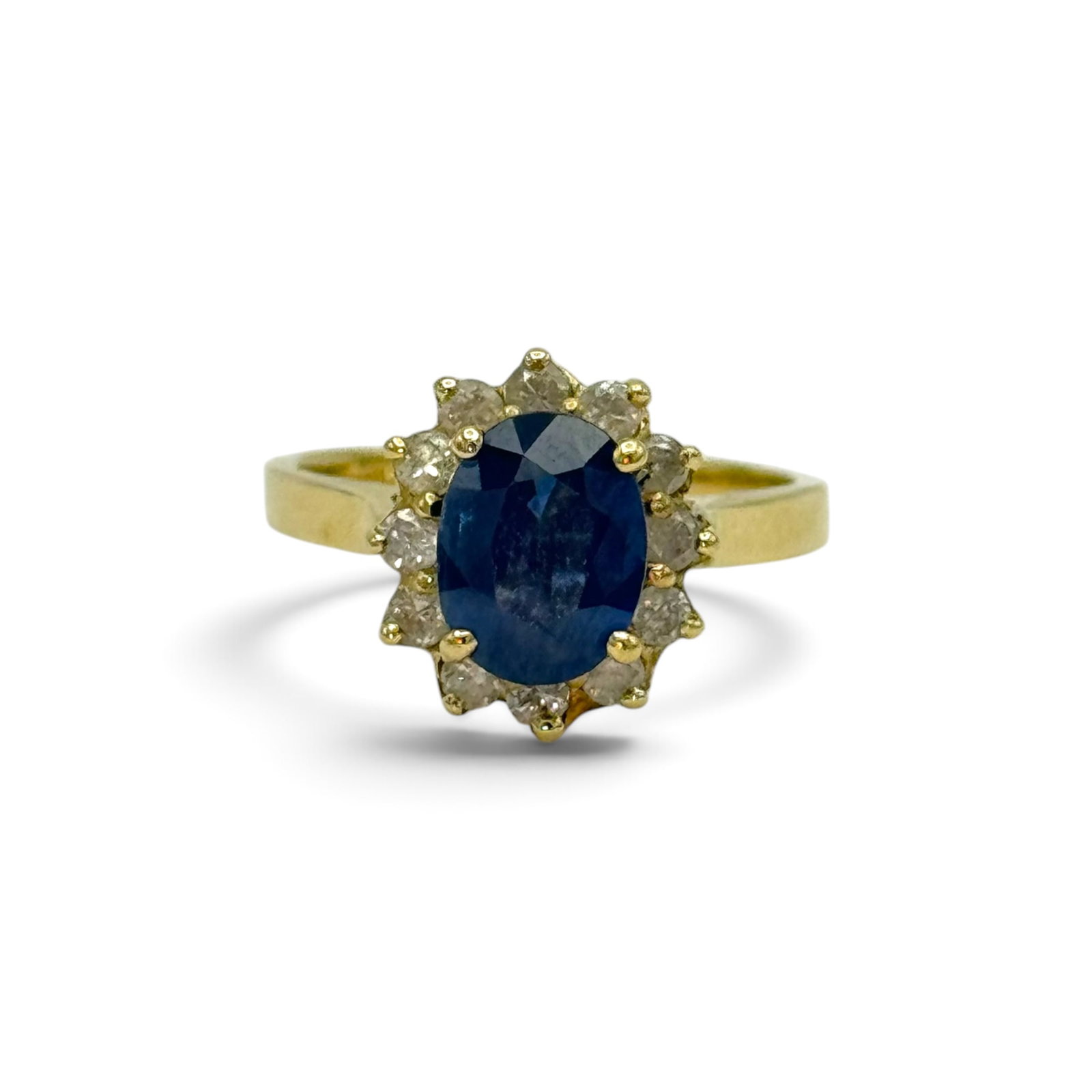 Sapphire, 14k White Gold Ring: Featuring twelve round-cut sapphires weighing a total of approximately 0.60 ctw., set in a 14k white gold, anniversary style ring mounting, size 7 3/4. Gross weight: 3.1 grams.