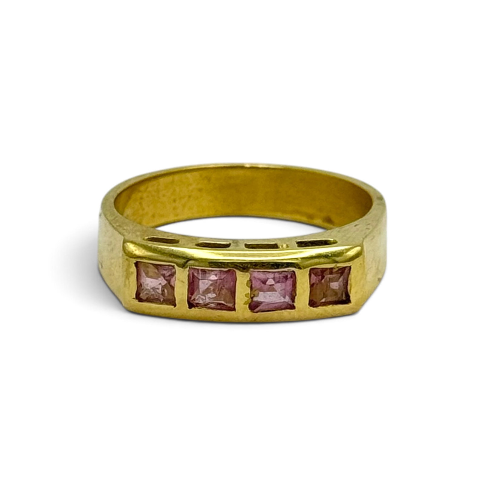 Pink Sapphire, 14k Yellow Gold Ring: Featuring four square step-cut pink sapphires weighing a total of approximately 0.55 ctw., set in a 14k yellow gold ring mounting, size 6 1/2. Gross weight: 4.3 grams.