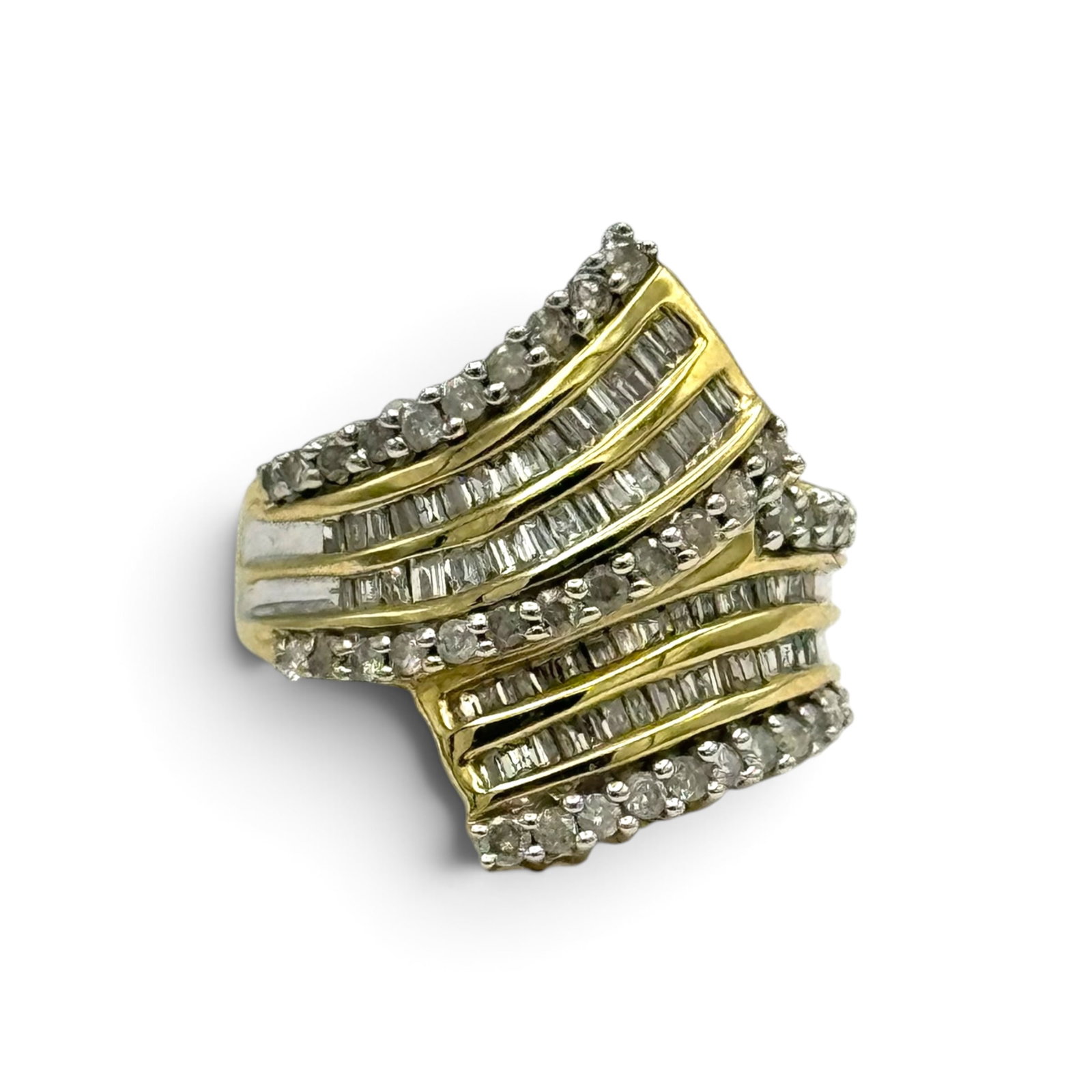 Diamond, 10k Yellow Gold Ring: Featuring one hundred round brillant-cut and baguette-cut diamonds weighing a total of approximately 0.95 ctw., set in a by-pass style, 10k yellow gold ring mounting, size 6 1/2. Gross weight: 5.5